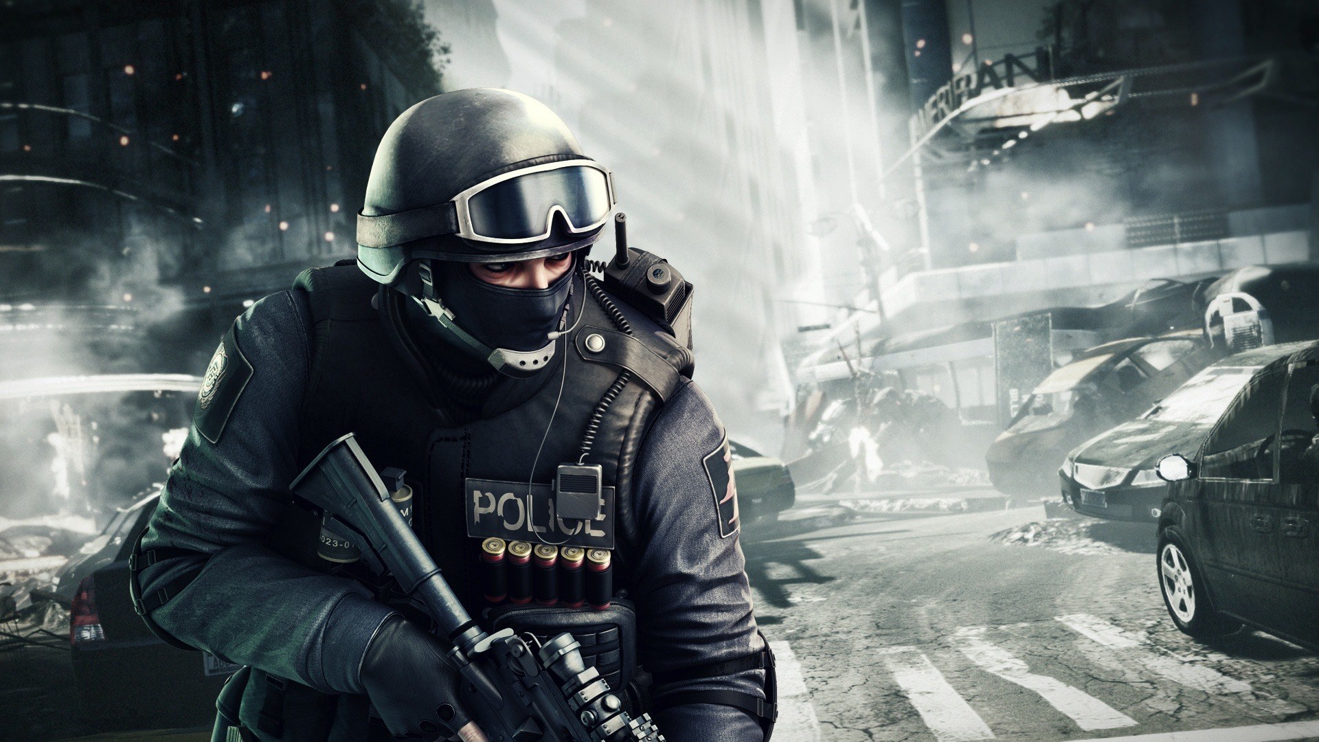 Police officer in tactical gear holding a rifle HD Wallpaper