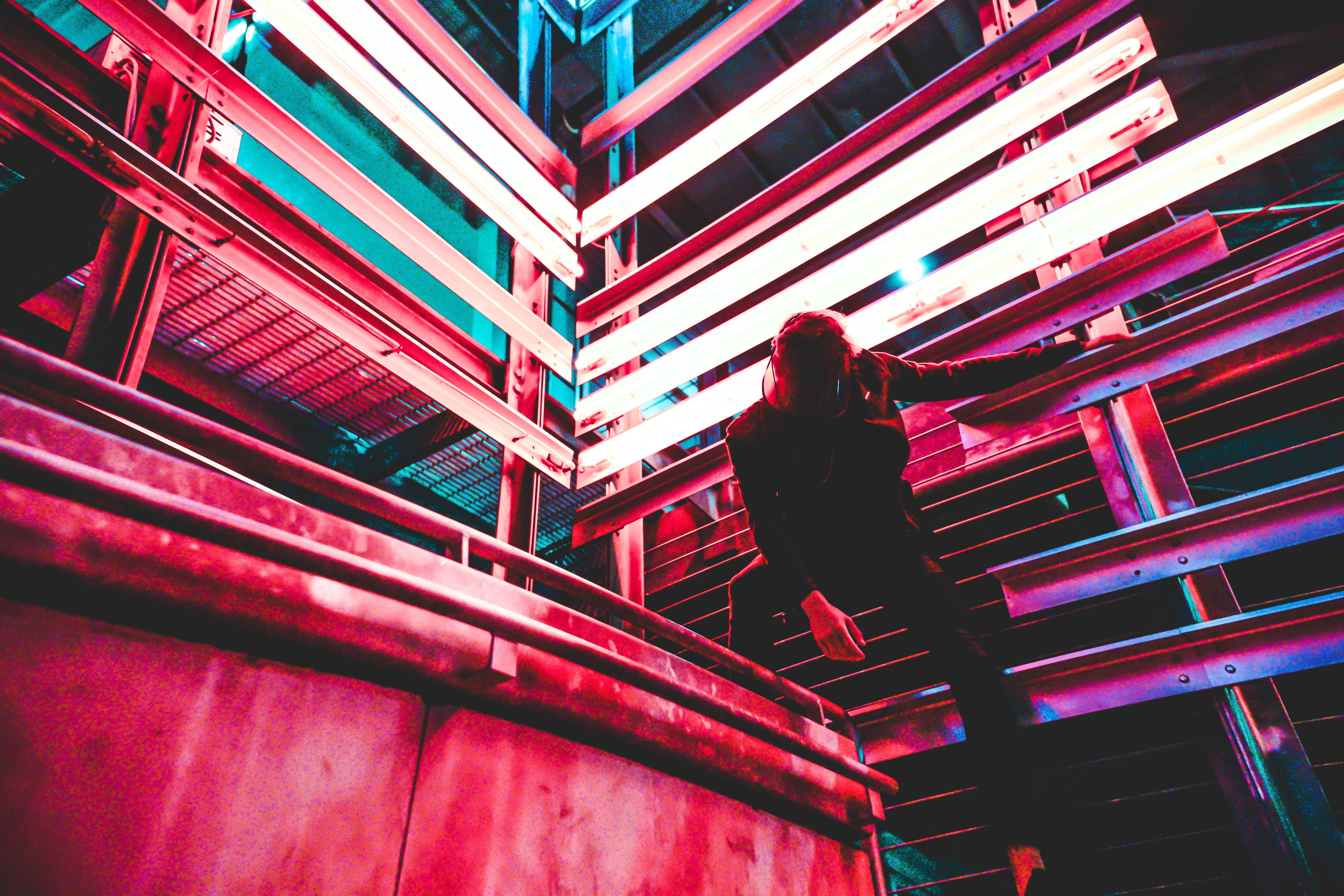 Person in a dark room with neon lights HD Wallpaper