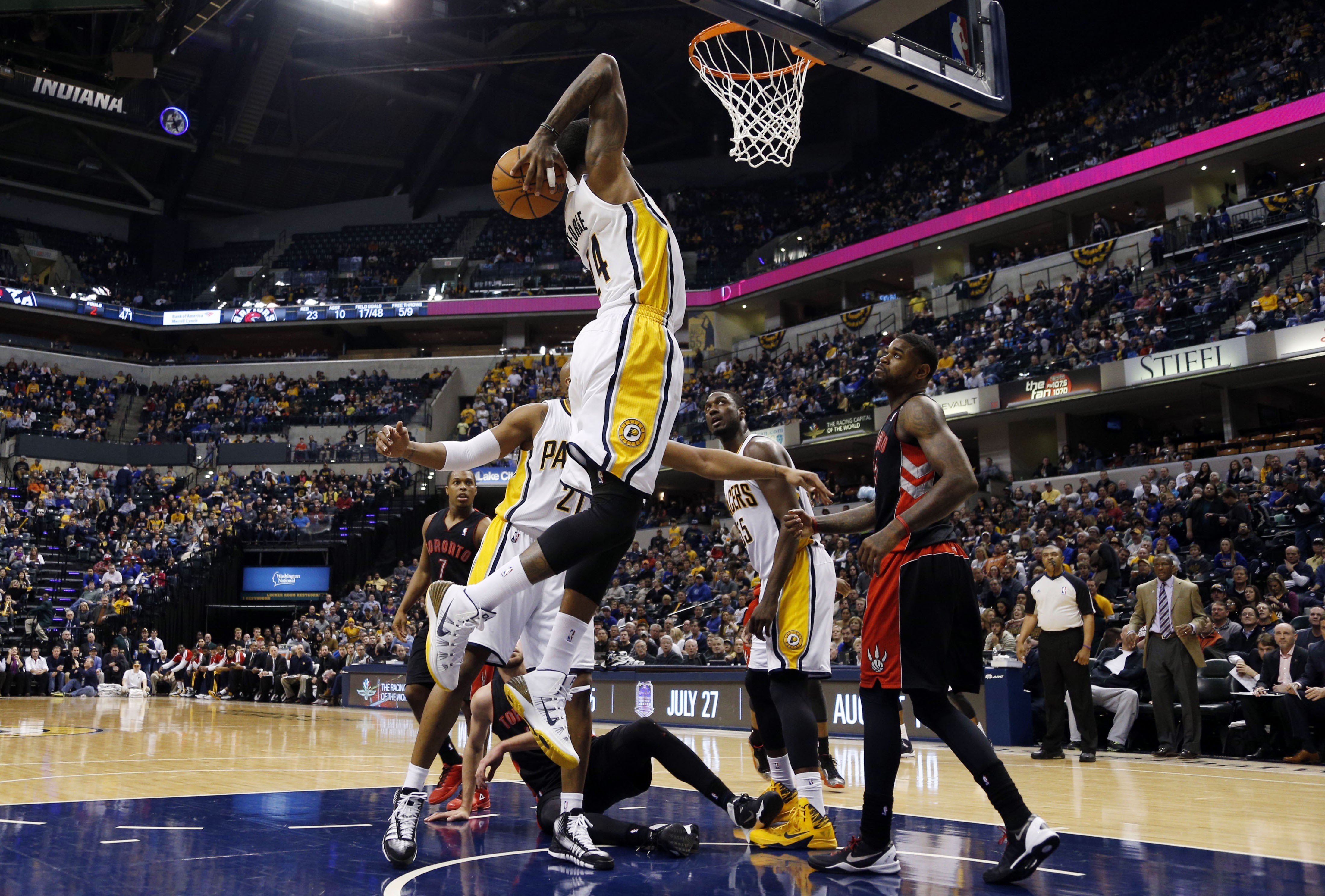 NBA basketball game with players dunking and defending HD Wallpaper