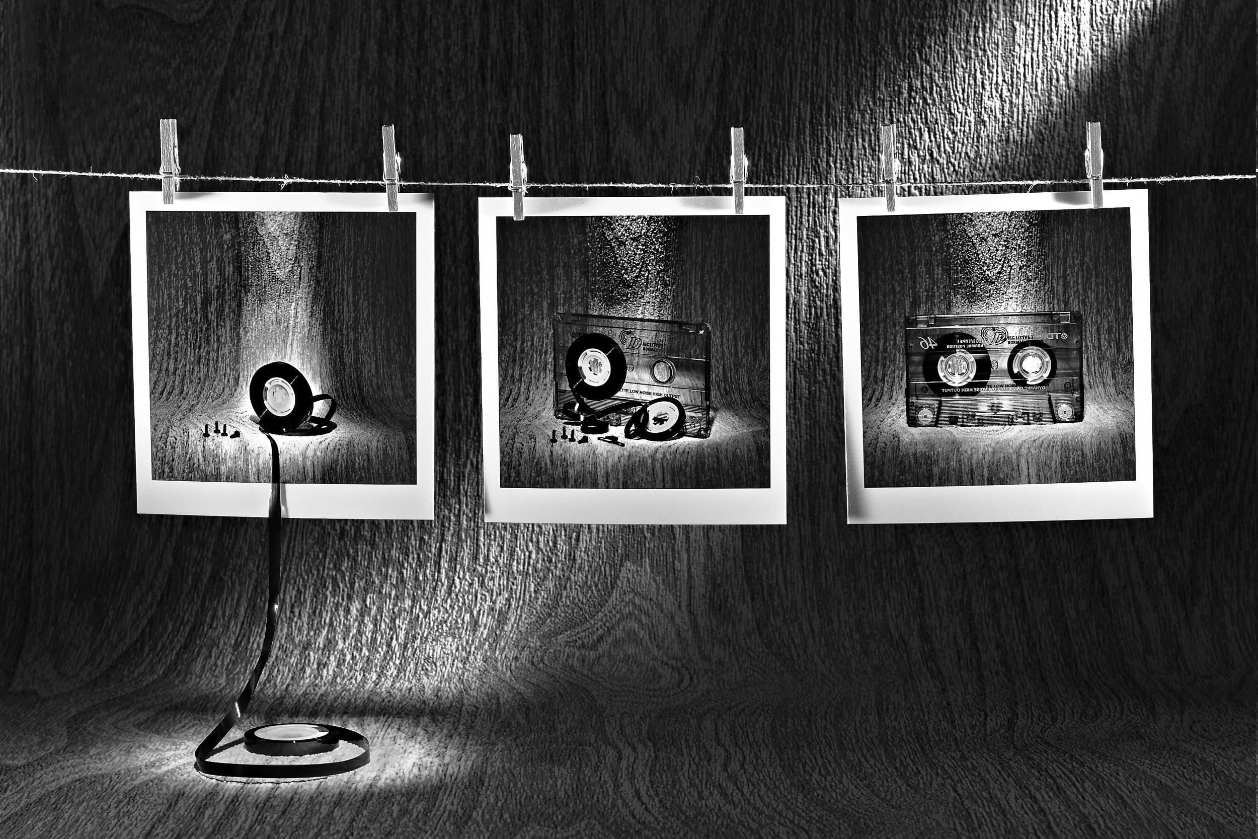 Cassettes and tape reel on display HD Wallpaper