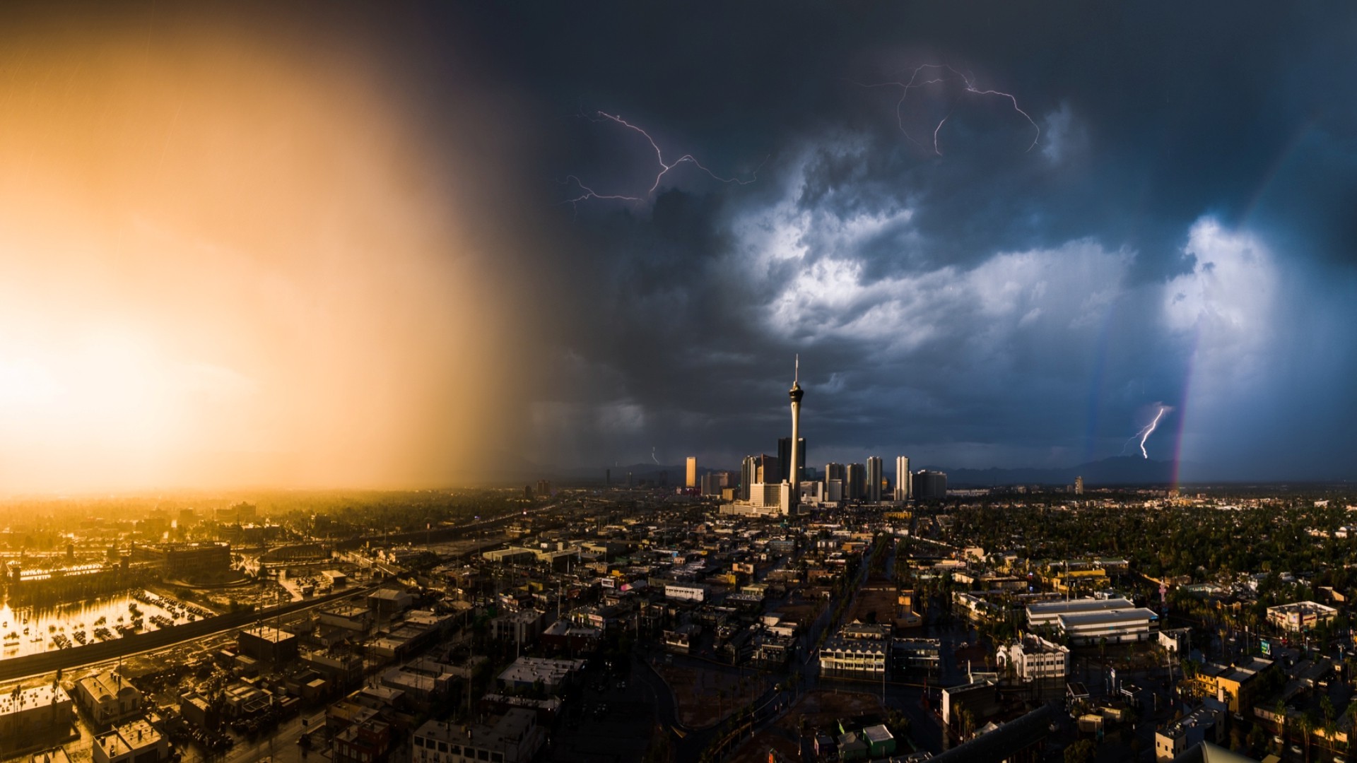 Las Vegas cityscape during a thunderstorm with lightning and sunset HD Wallpaper