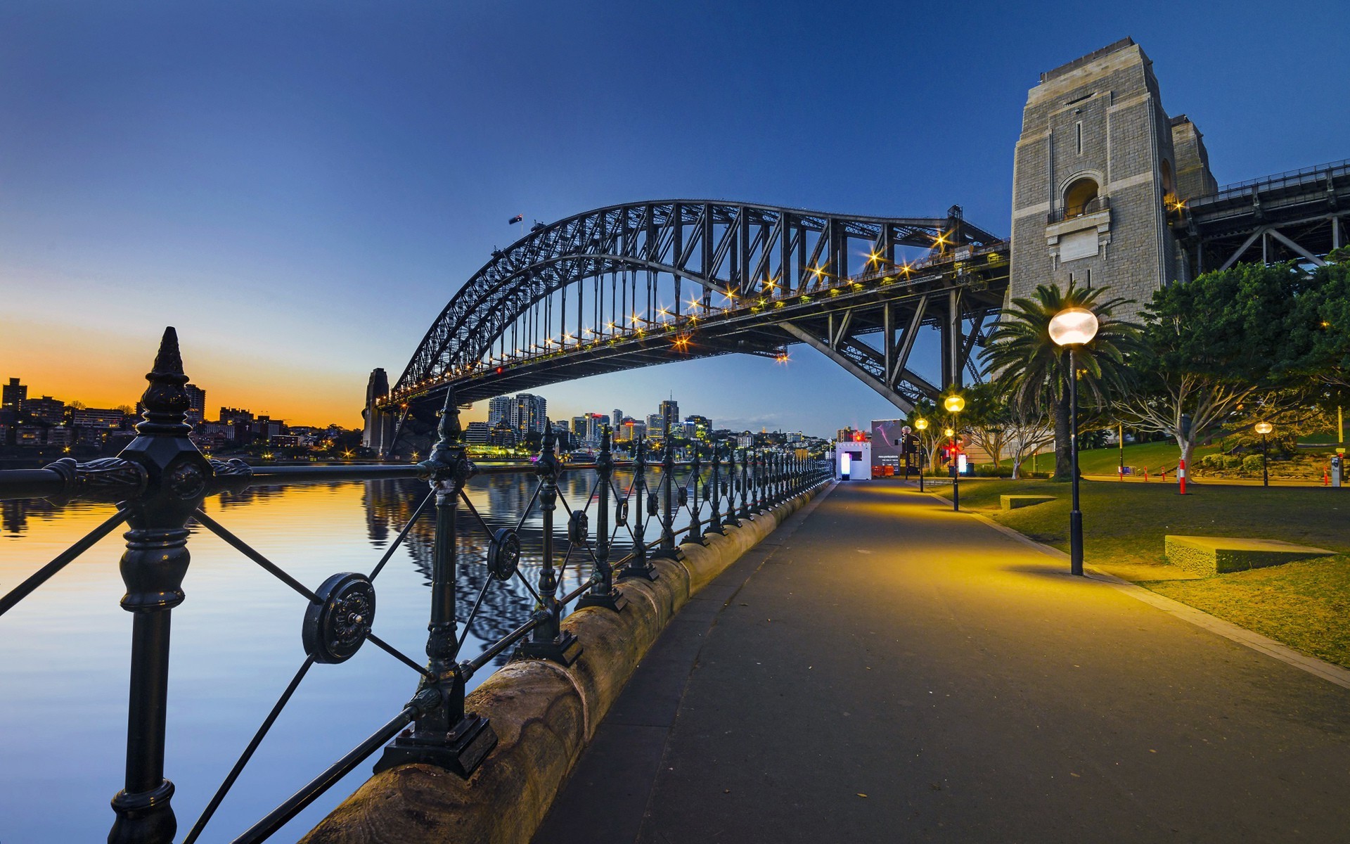 Sydney Harbour Bridge at sunset with city skyline HD Wallpaper
