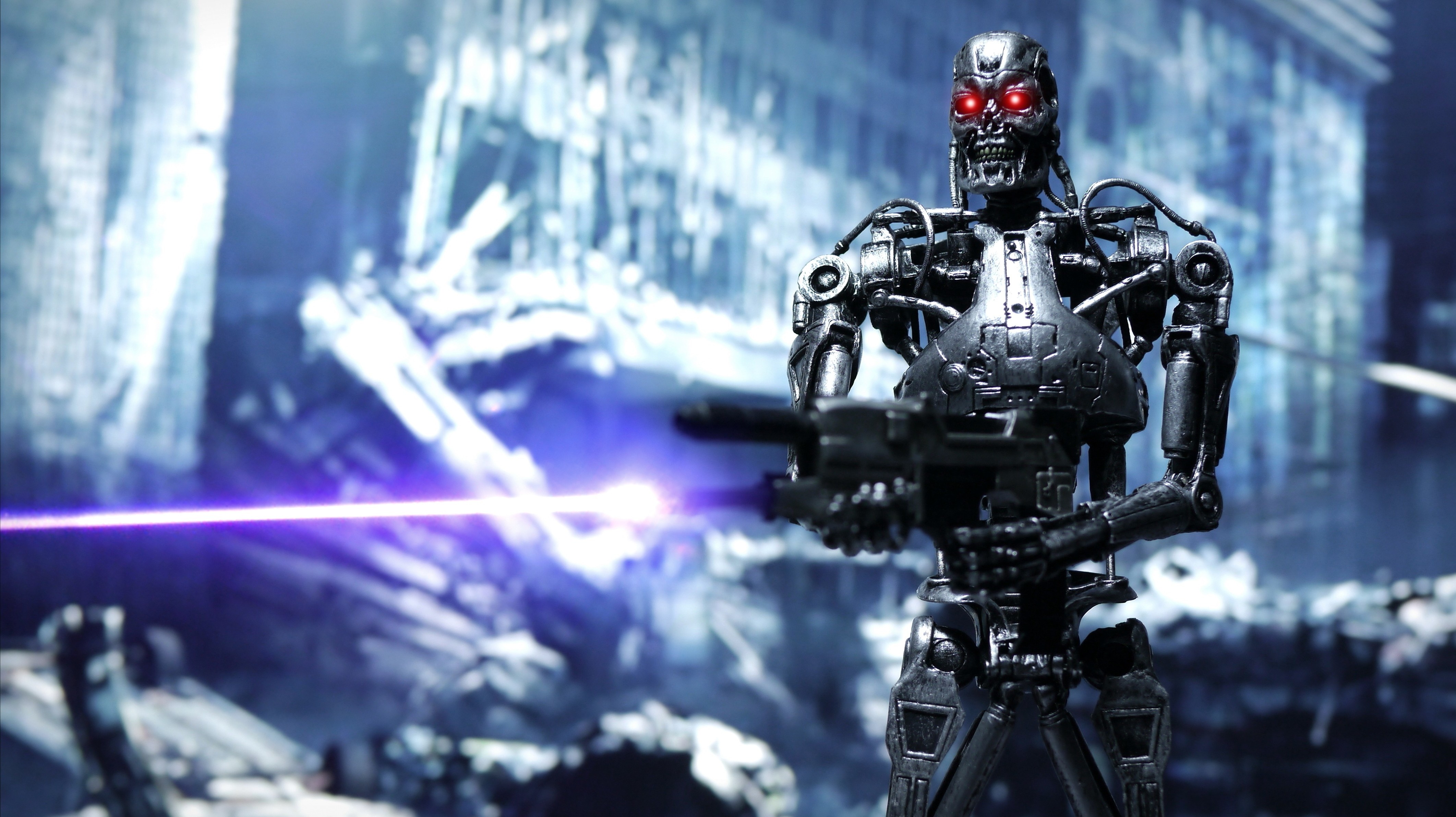 Terminator T-800 action figure firing laser HD Wallpaper
