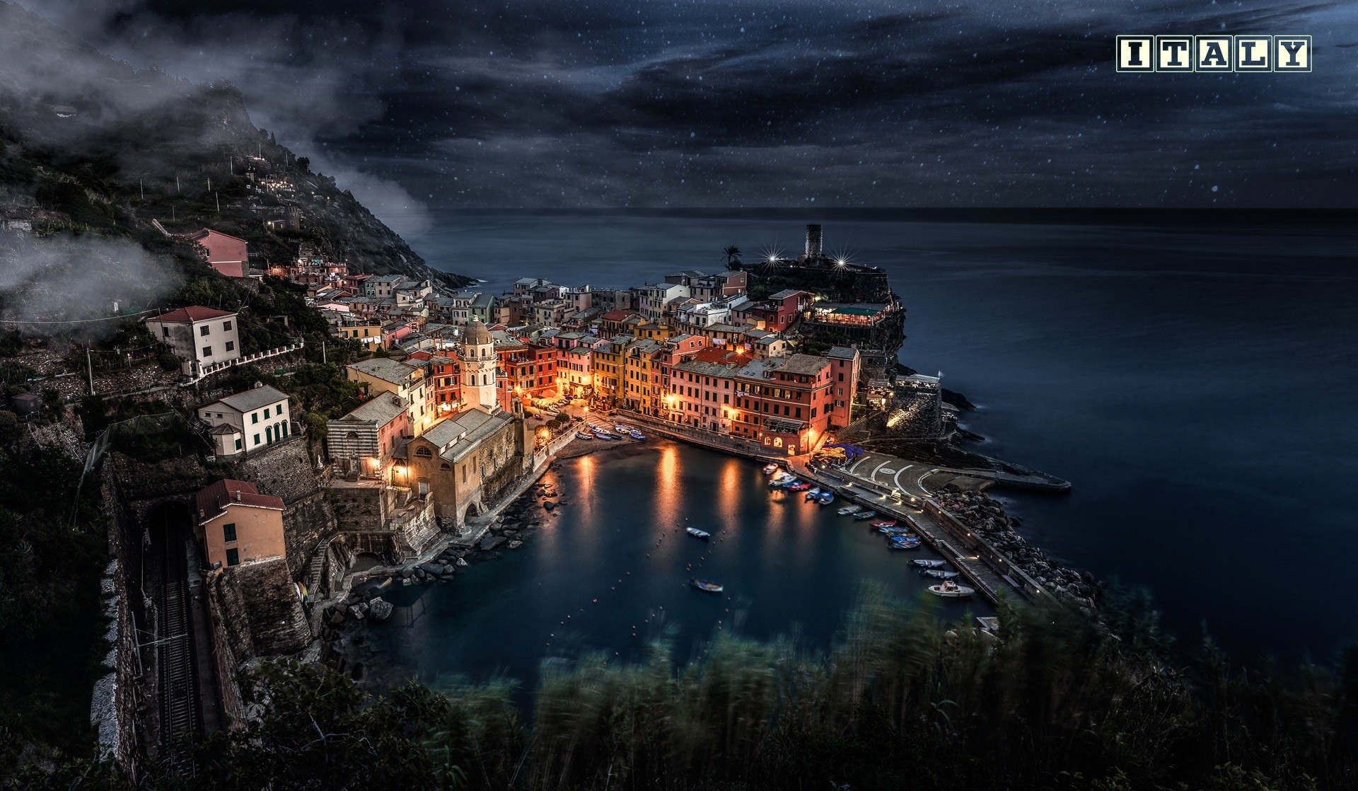 Vernazza, Italy cityscape at night with harbor lights HD Wallpaper