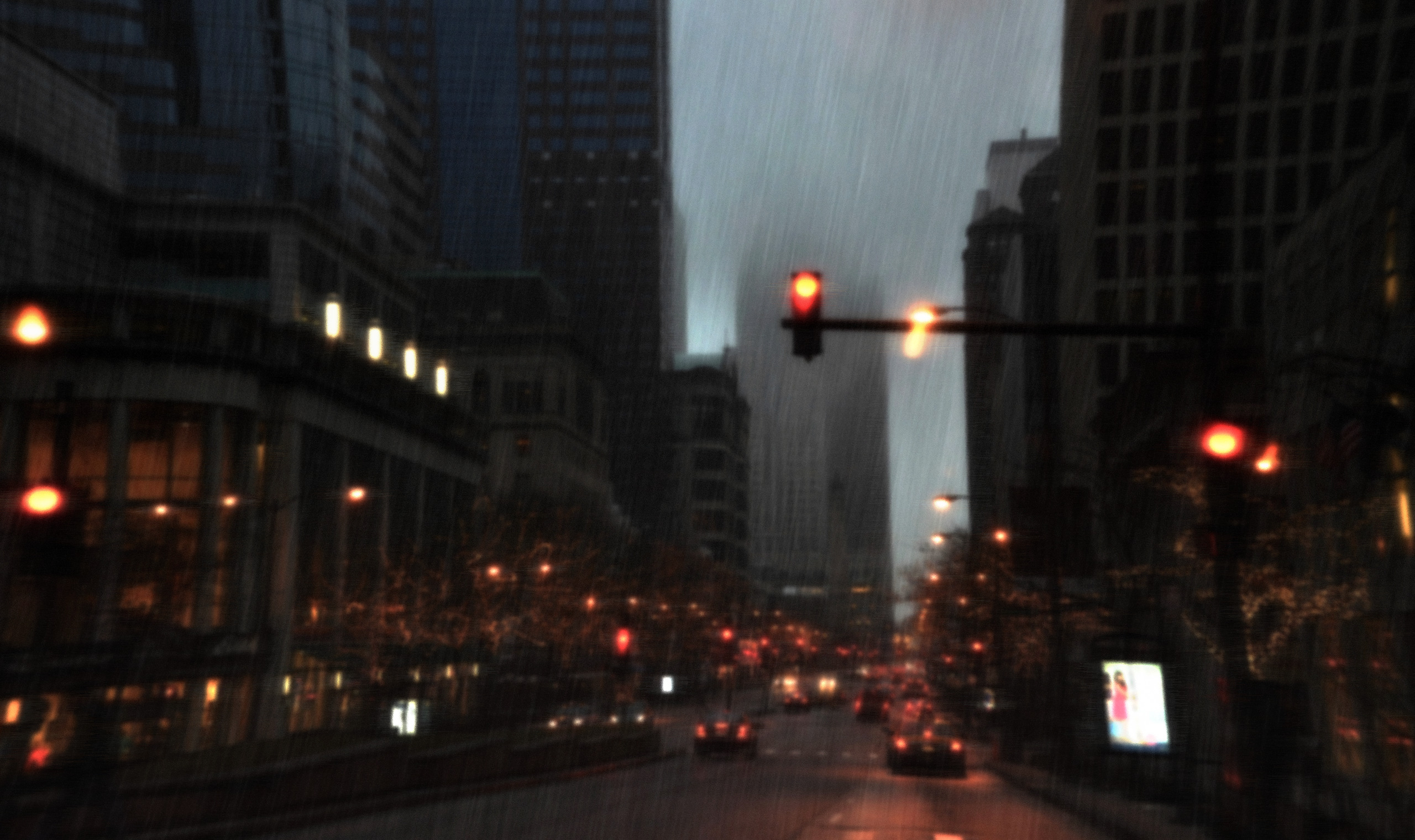 Rainy cityscape with traffic lights and cars HD Wallpaper