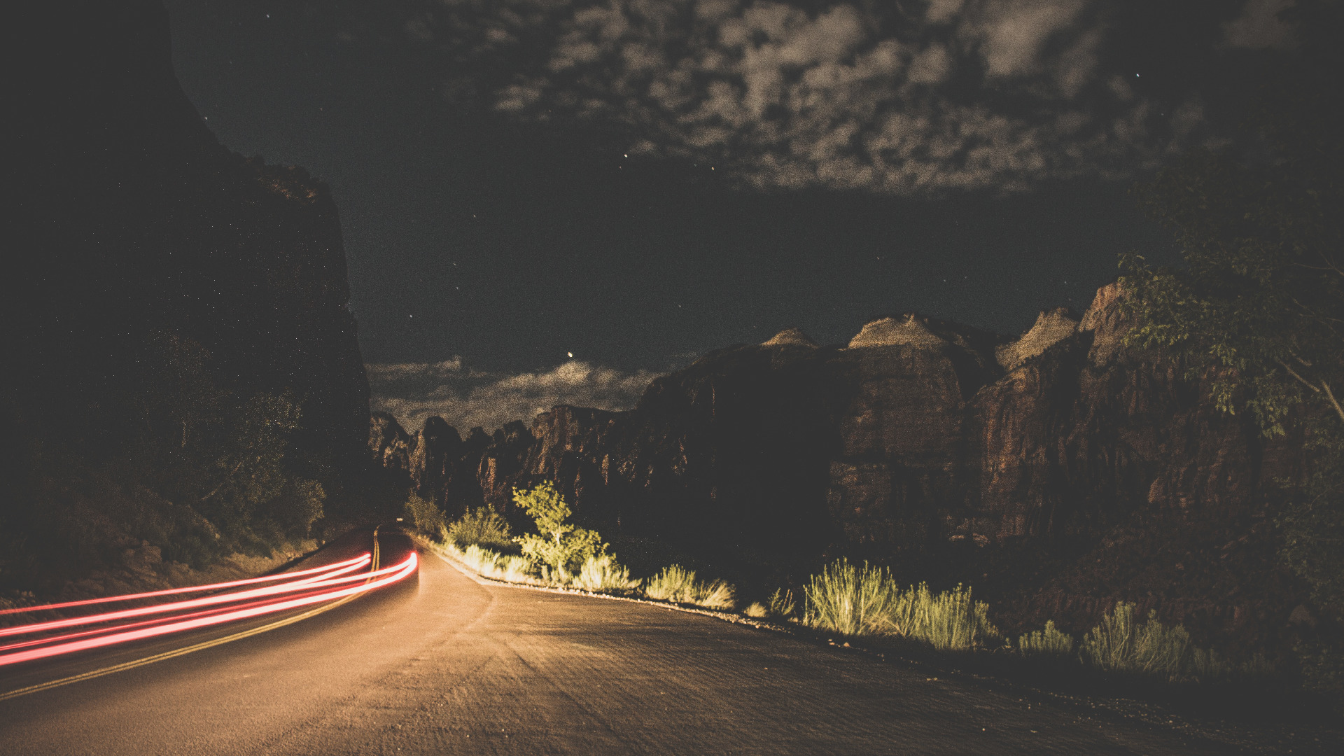 Night road with light trails and mountains HD Wallpaper