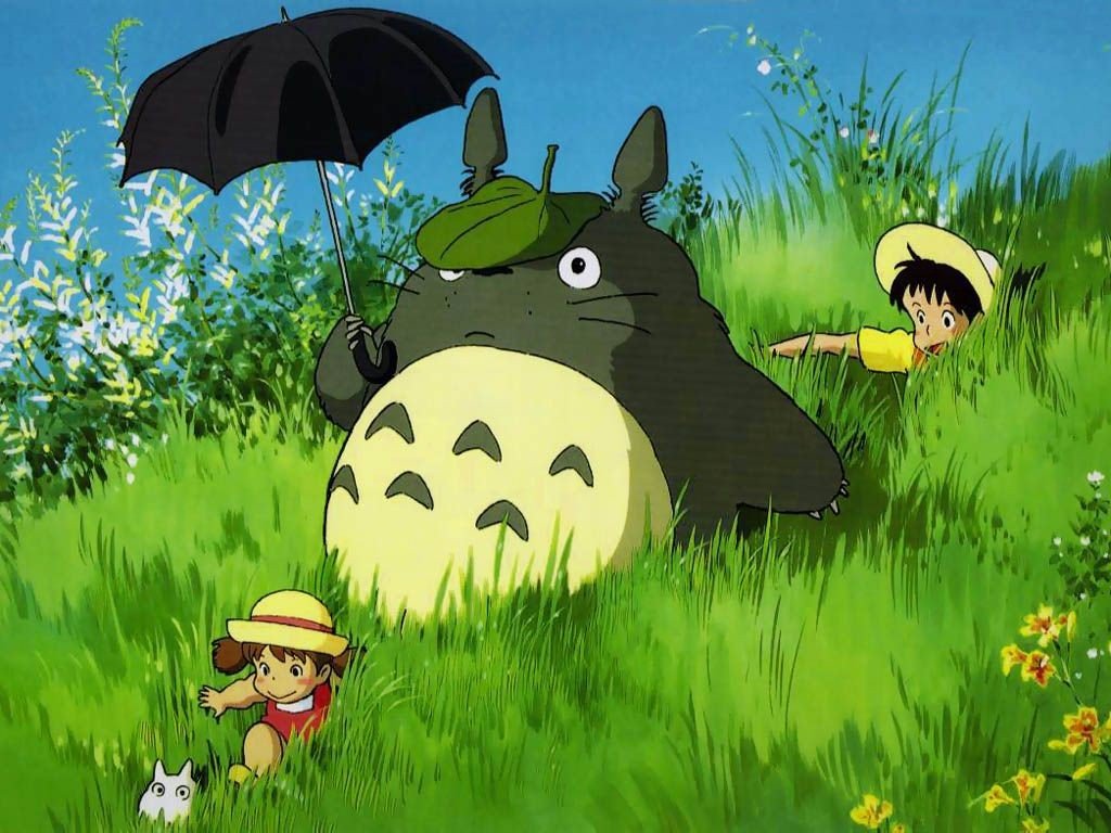 Totoro and children in a grassy field HD Wallpaper
