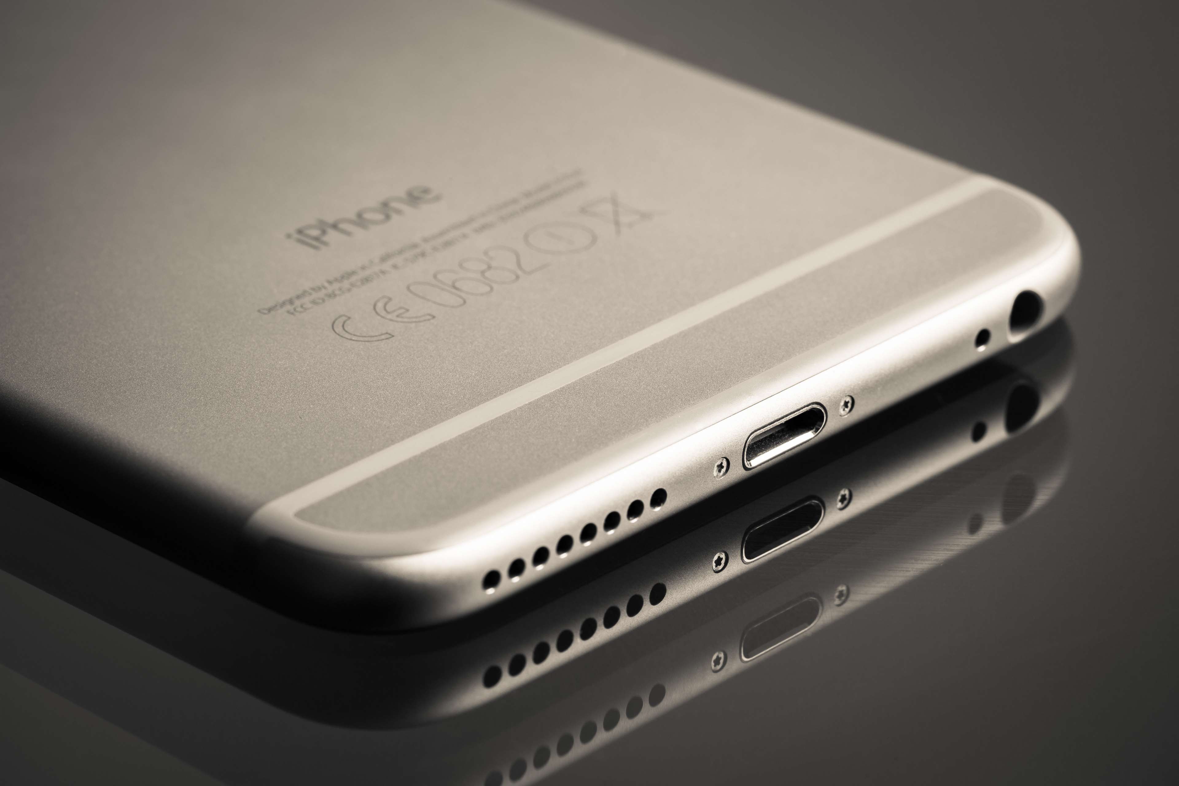 Close-up of an iPhone 6 Plus bottom edge HD Wallpaper