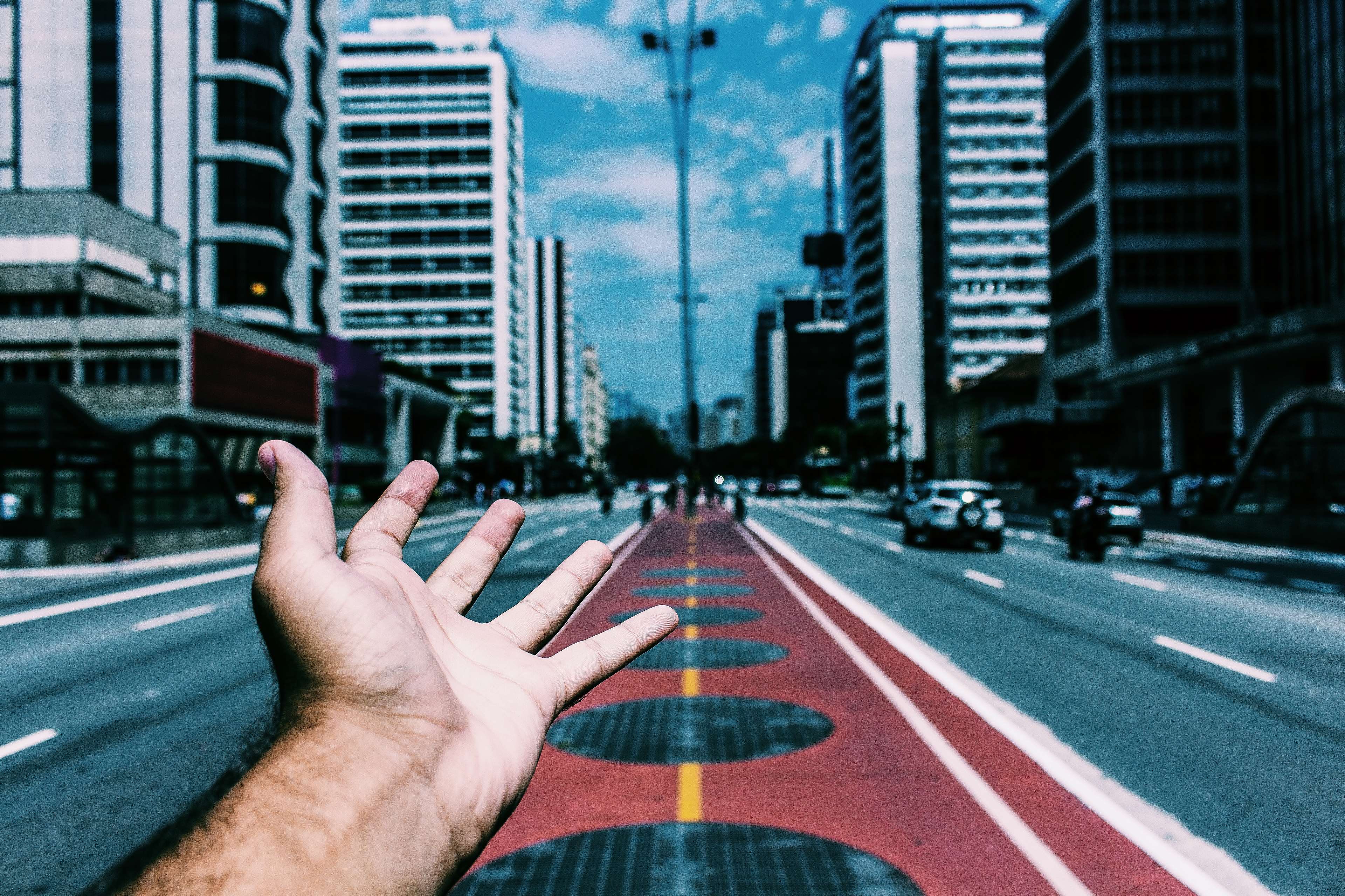 Hand reaching out on Avenida Paulista, Sao Paulo 4K HD Wallpaper