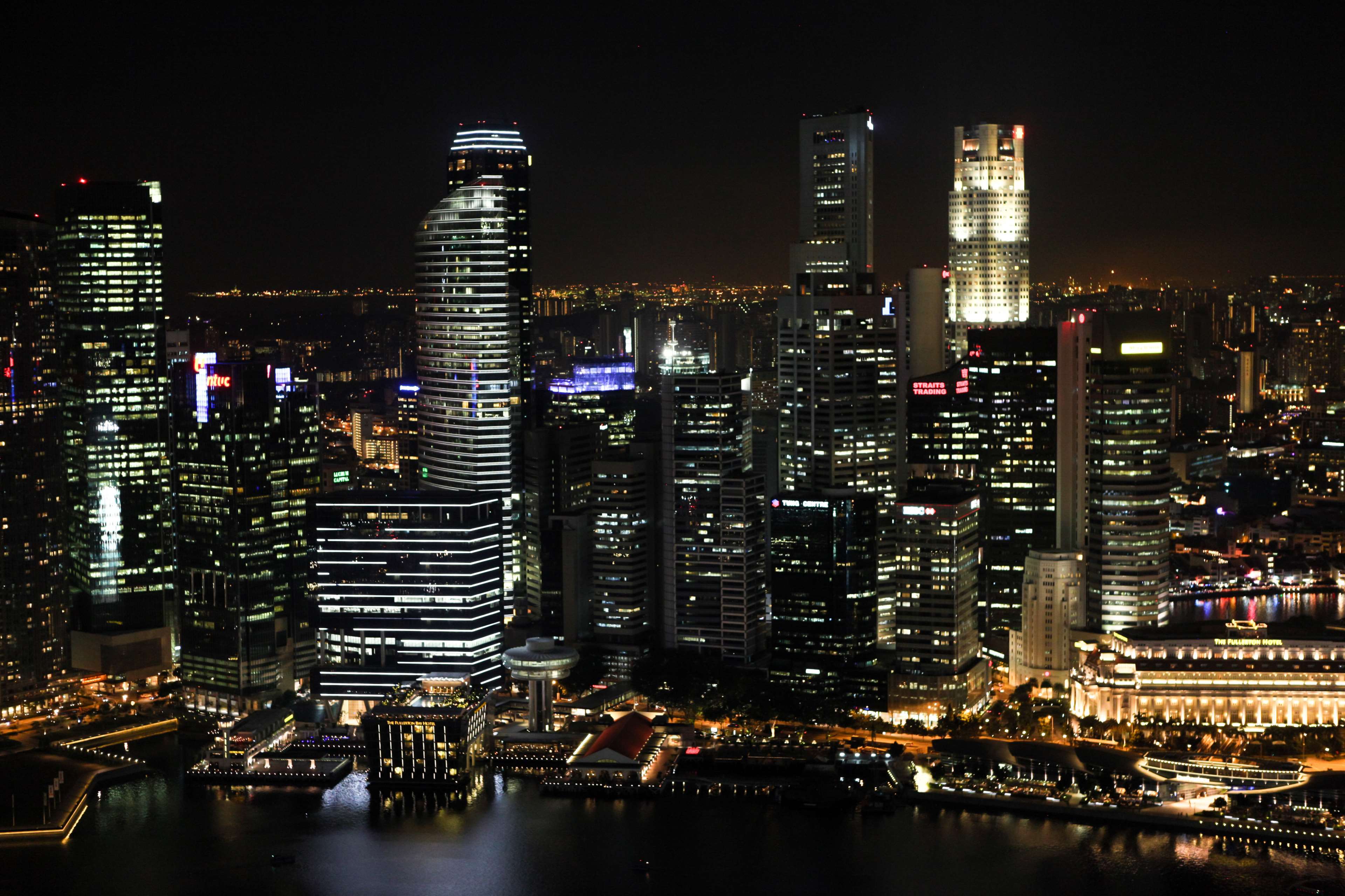 Cityscape with skyscrapers at night HD Wallpaper