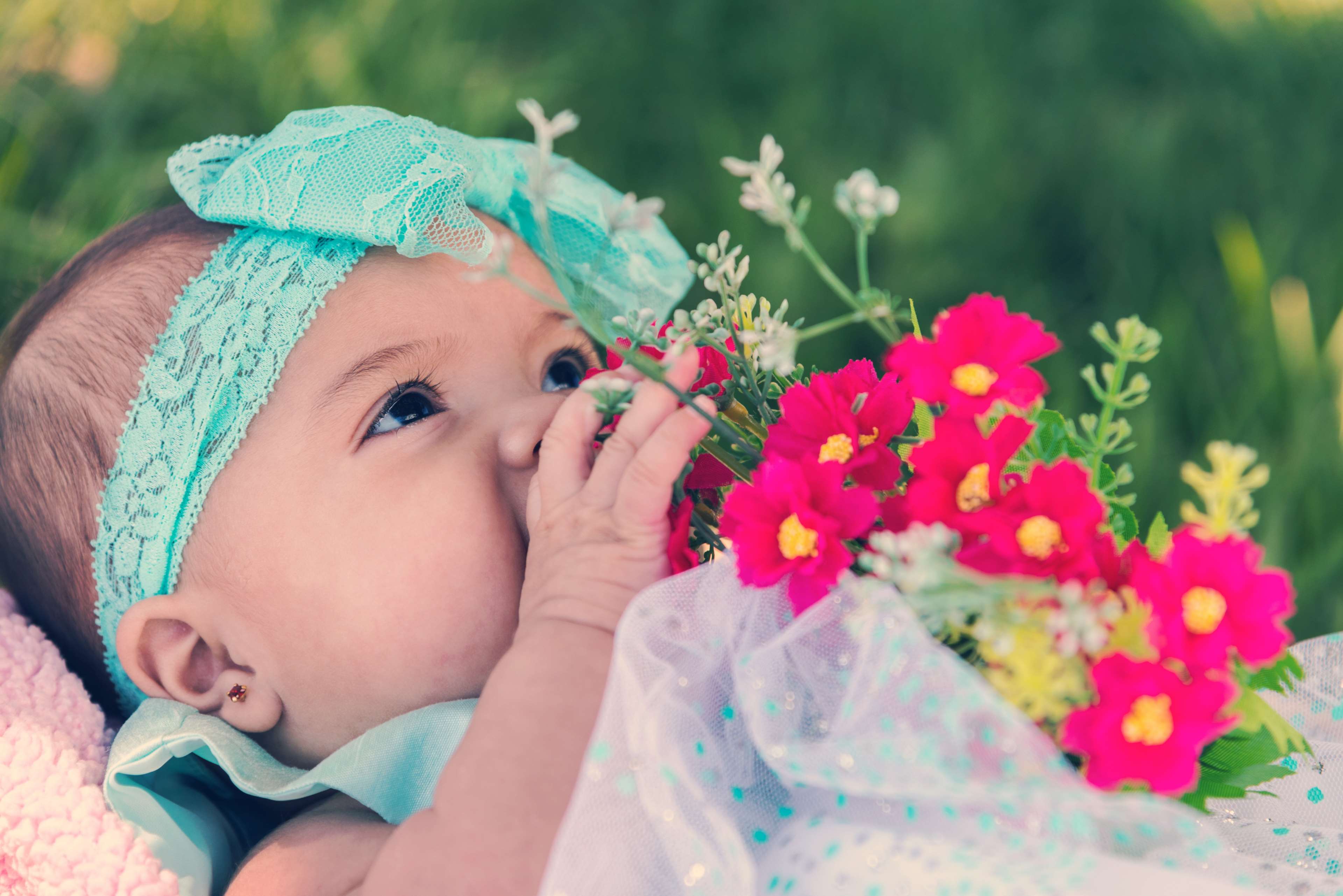 Baby girl with flowers and teal headband HD Wallpaper