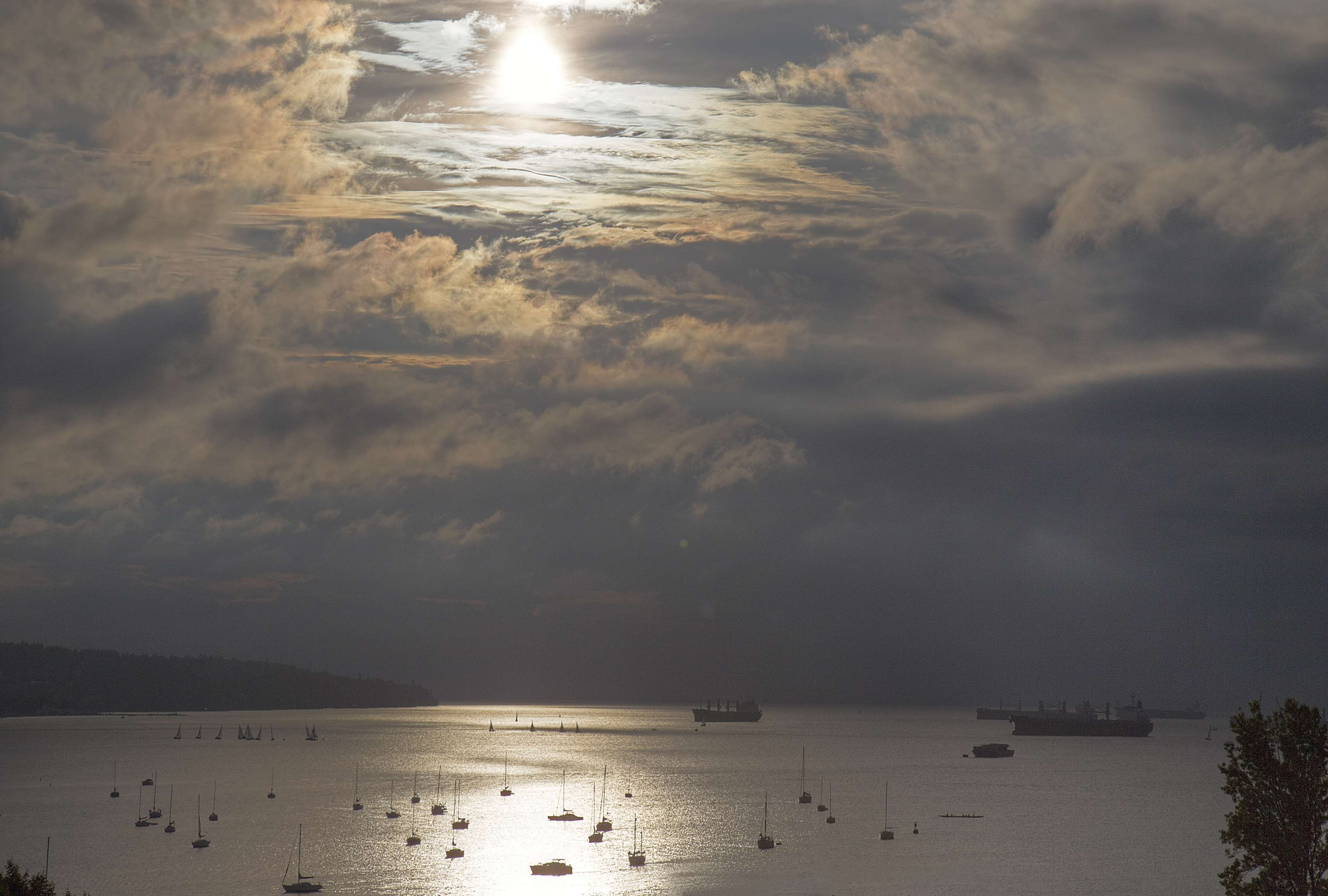 Boats and ships on the water under stormy clouds HD Wallpaper