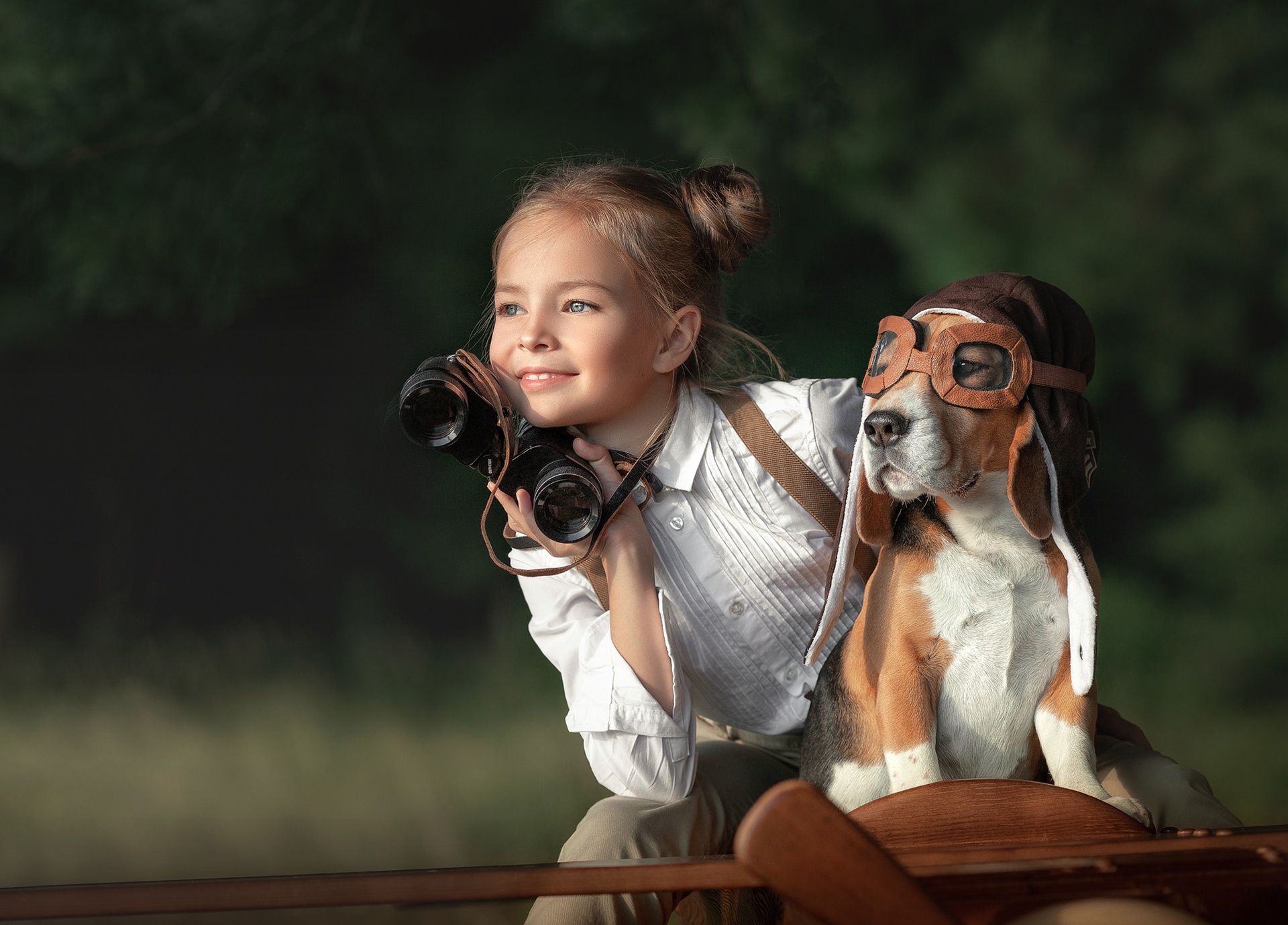 Girl with binoculars and beagle dog in aviator hat HD Wallpaper