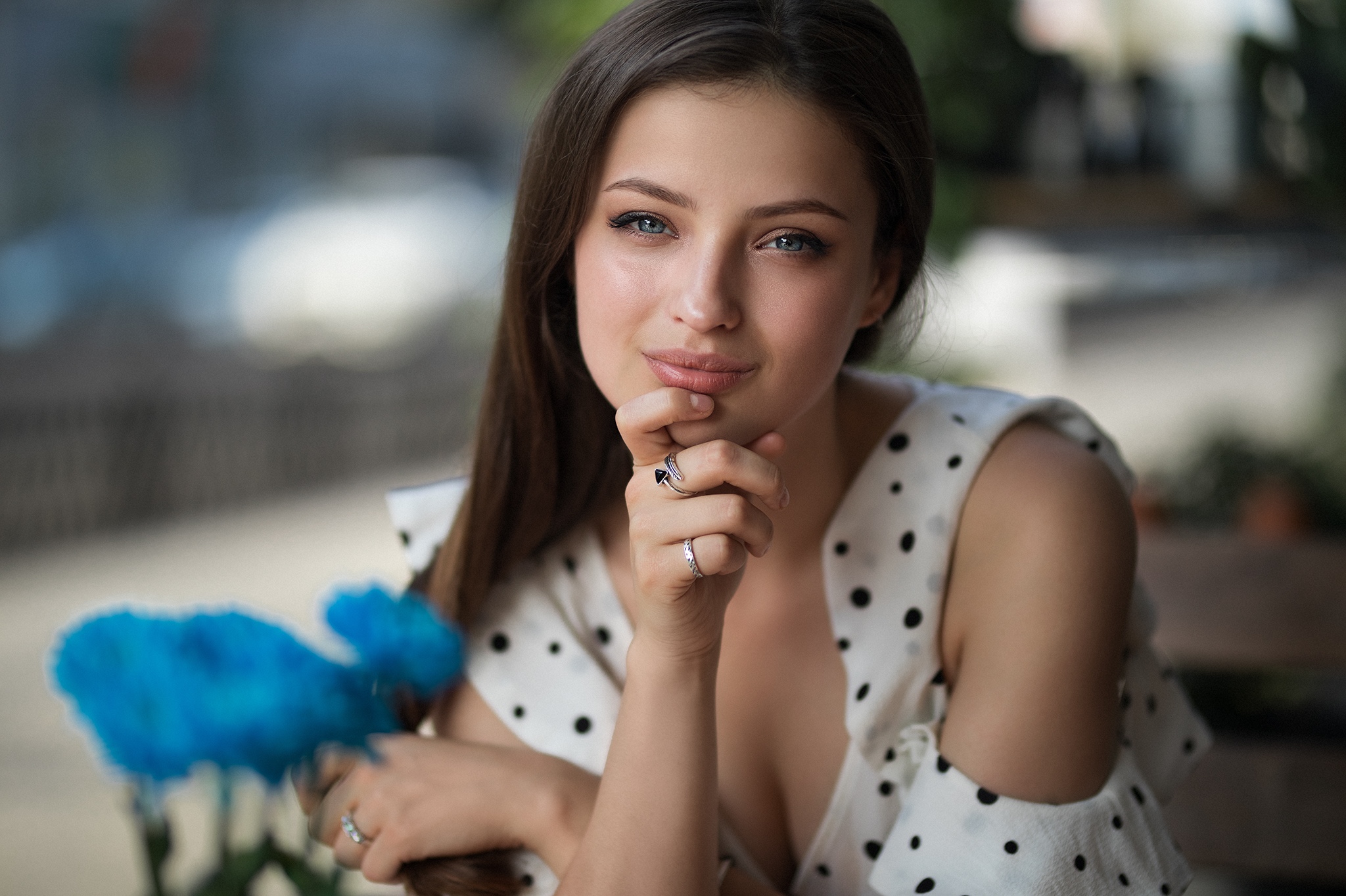 Woman with blue eyes and black hair wearing a polka dot dress HD Wallpaper