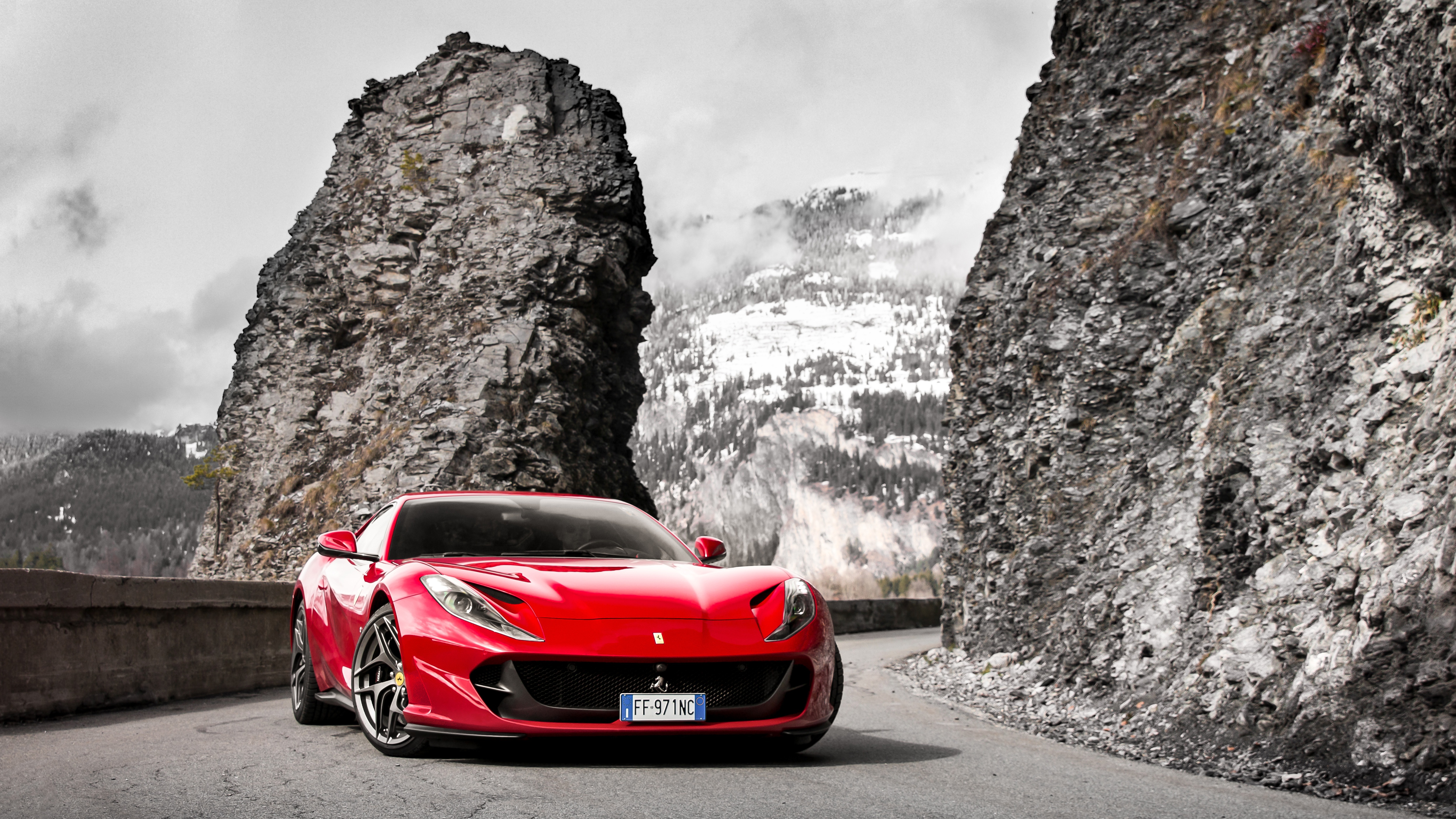 Red Ferrari 812 Superfast on a mountain road HD Wallpaper