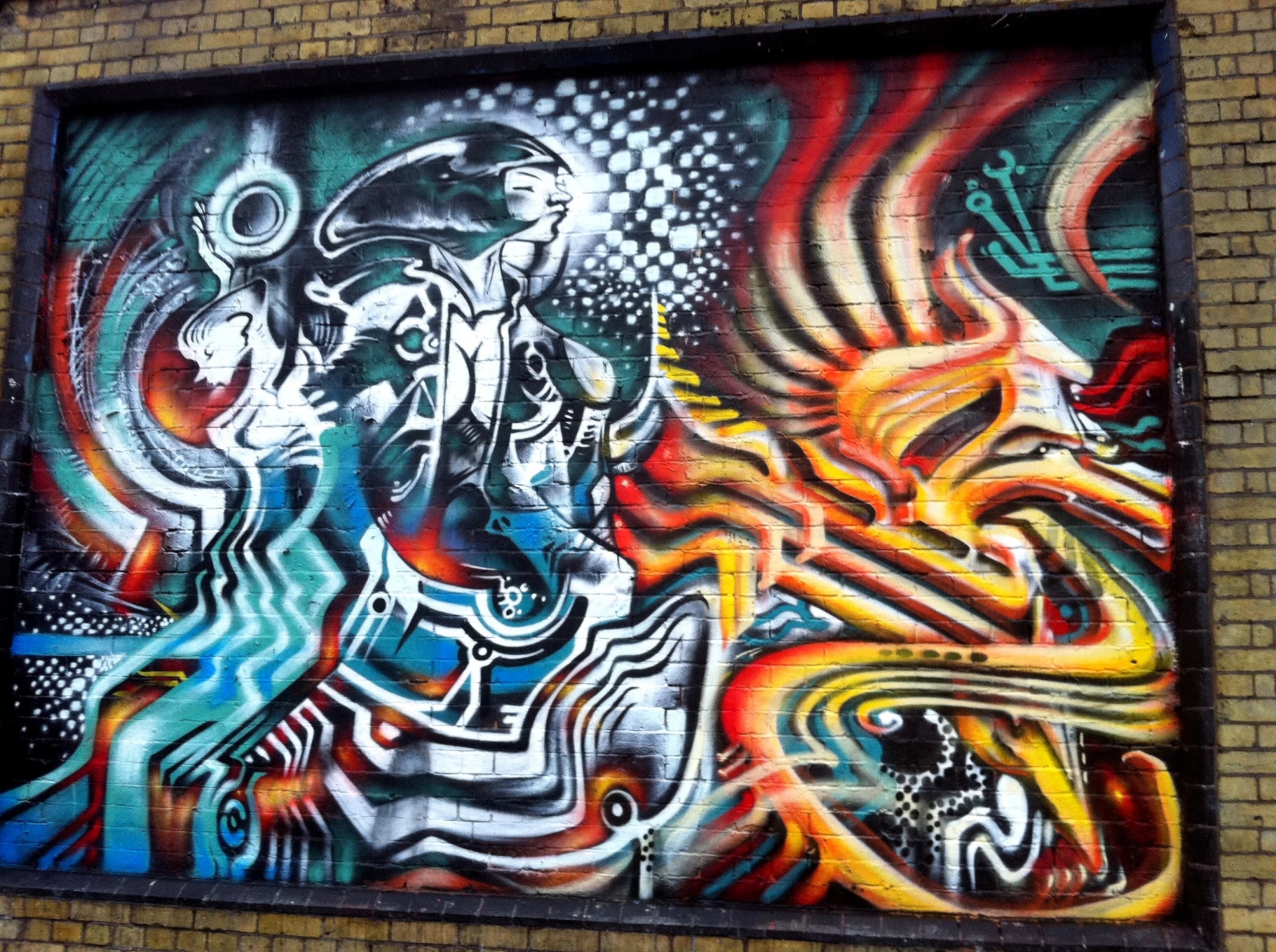 Graffiti mural with abstract figures and fiery elements HD Wallpaper