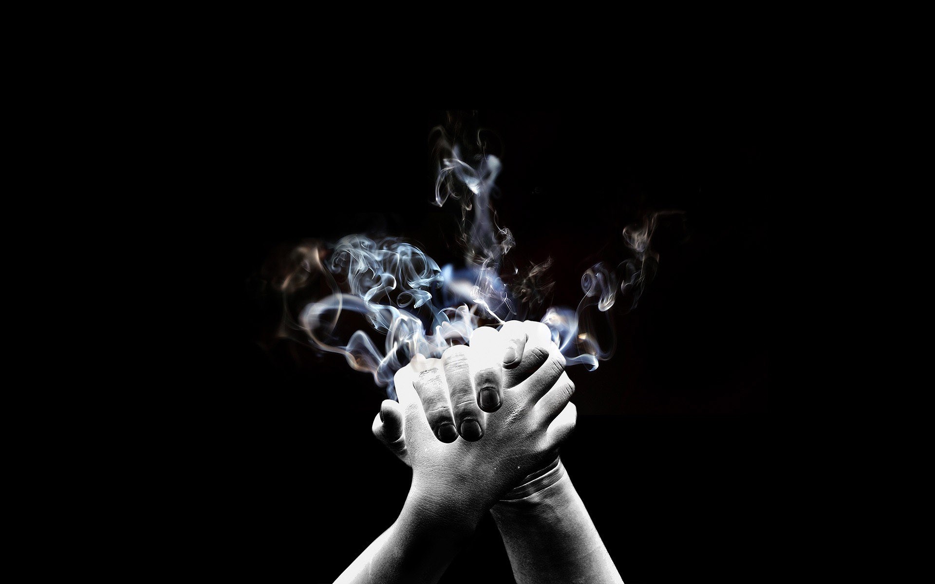 Smoke rising from clasped hands HD Wallpaper