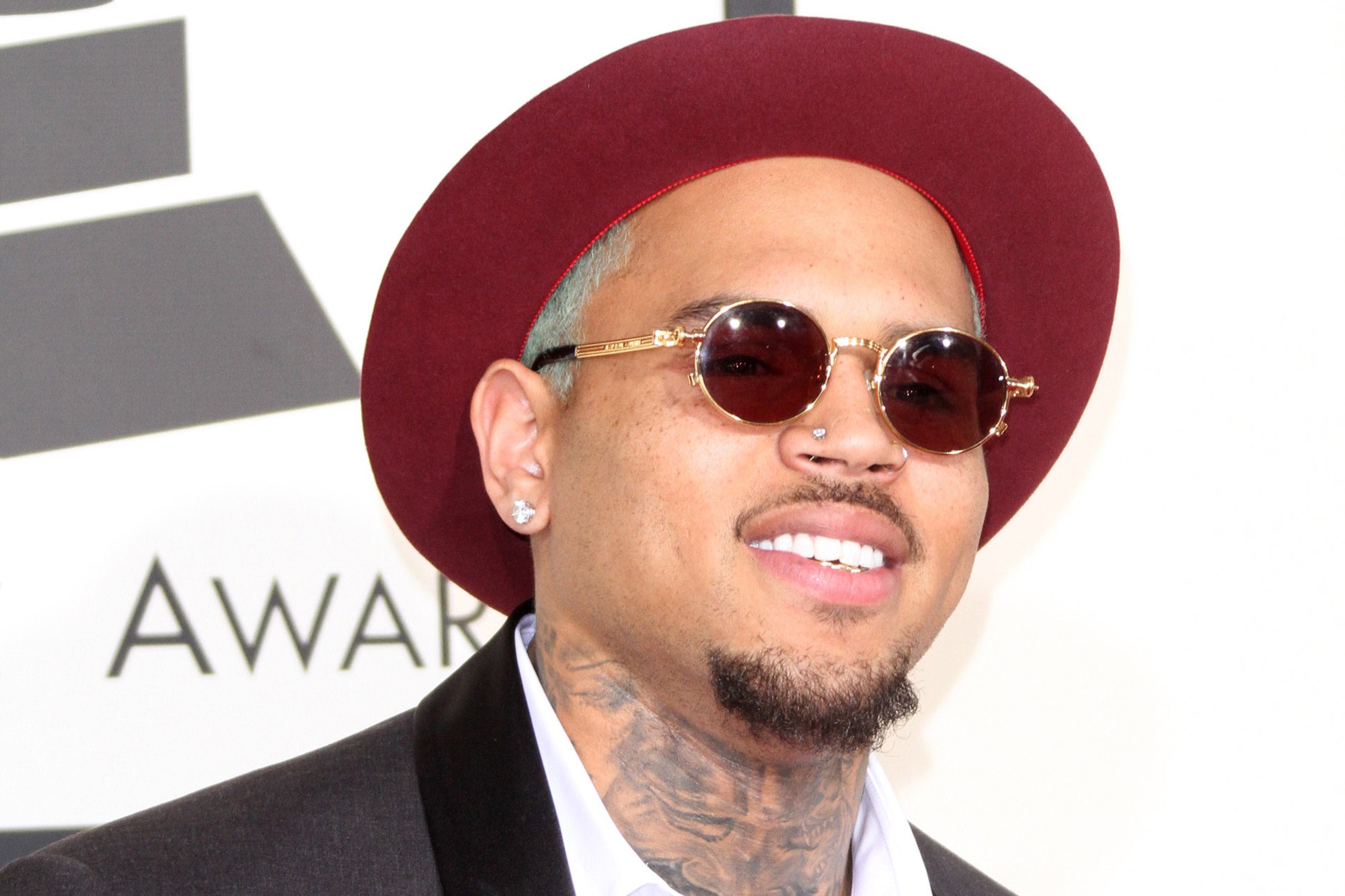 Chris Brown wearing a hat and sunglasses HD Wallpaper