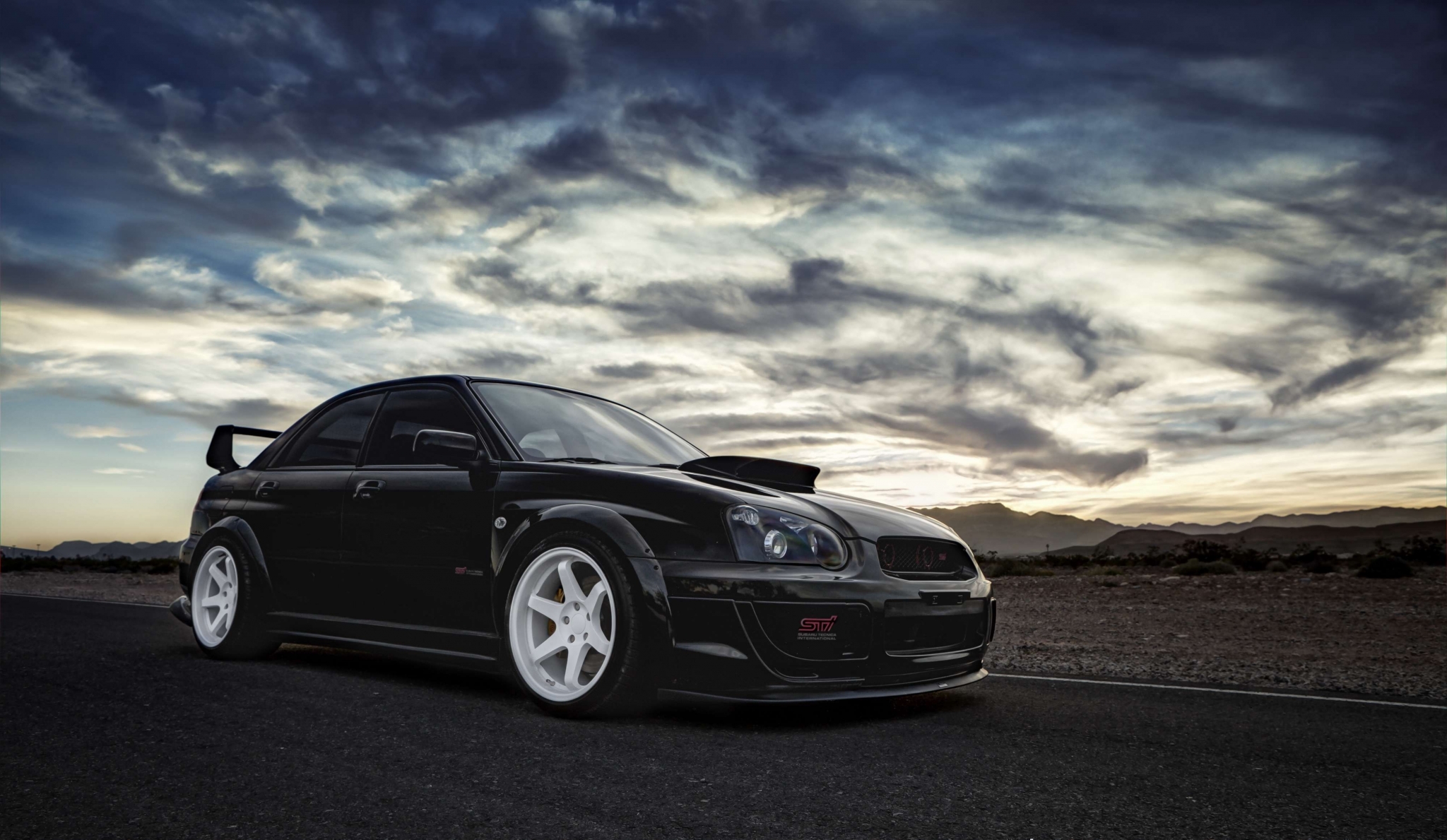 Black Subaru Impreza WRX STI with white wheels HD Wallpaper