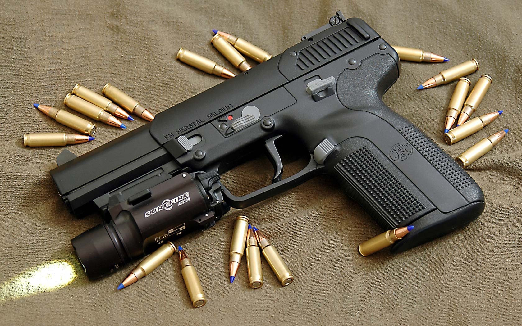 FN Herstal Belgium Five-seveN Pistol with Ammunition HD Wallpaper