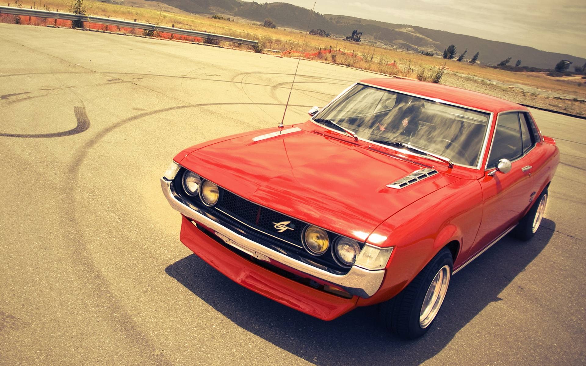 Red Toyota Celica TA22 GT on asphalt HD Wallpaper