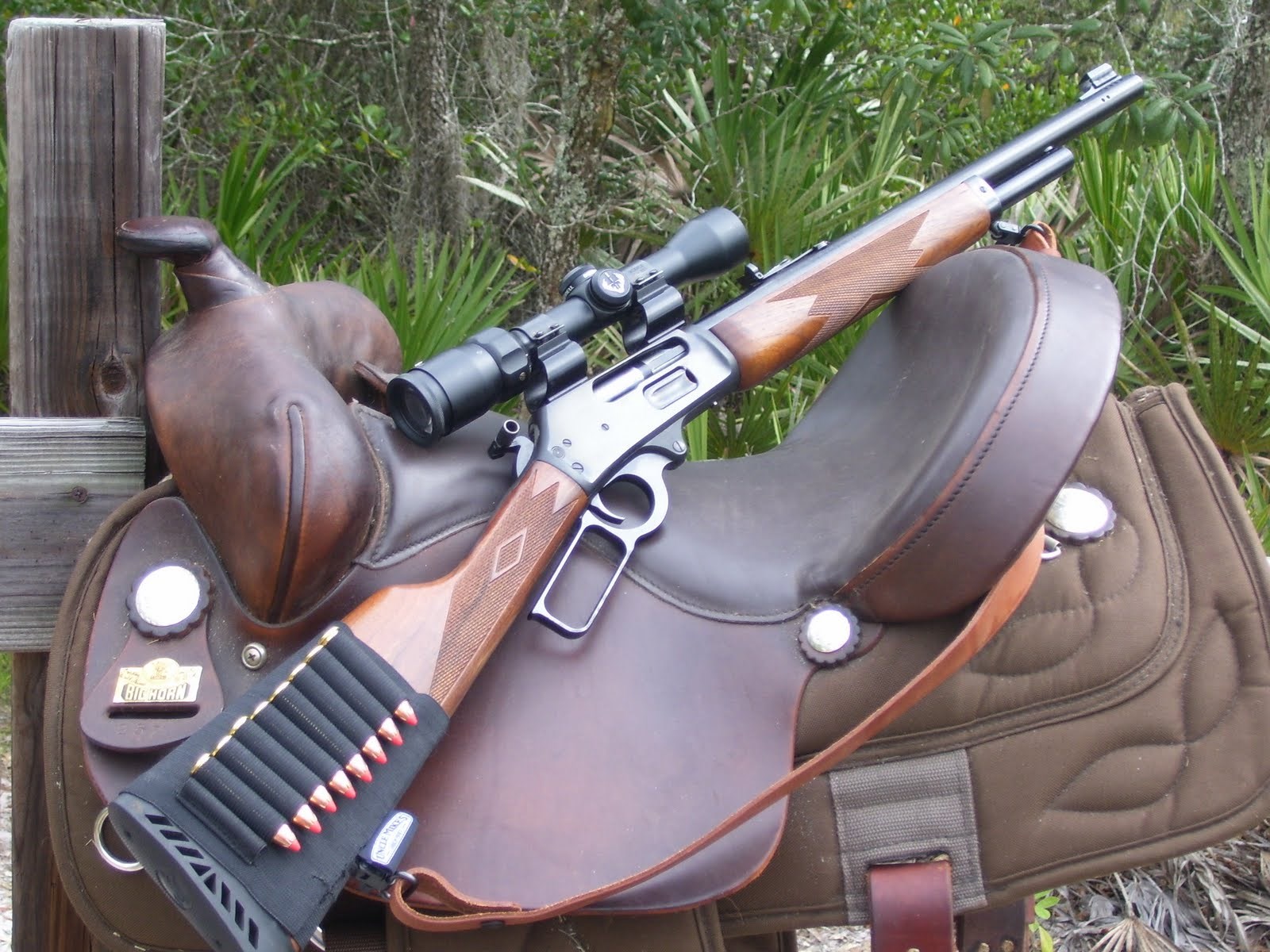 Marlin Model 1895GS rifle on a saddle HD Wallpaper