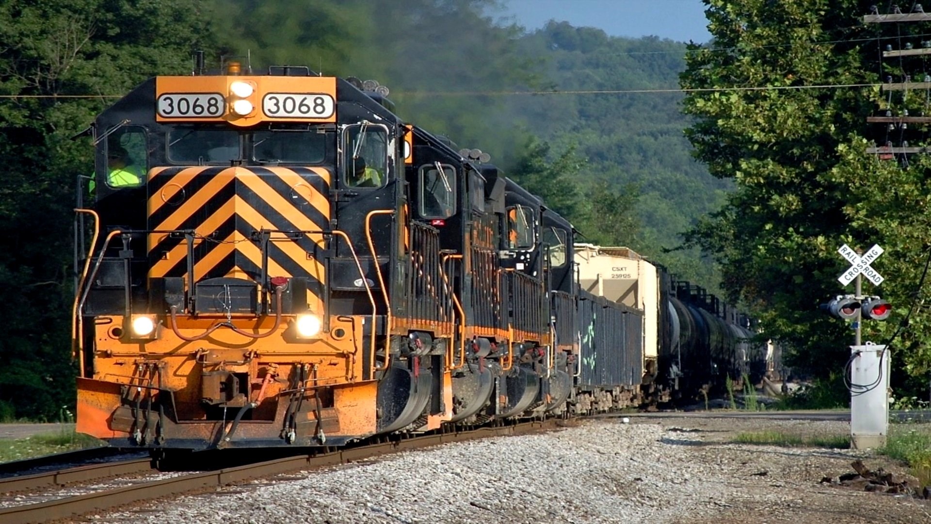 Train 3068 with freight cars on tracks HD Wallpaper
