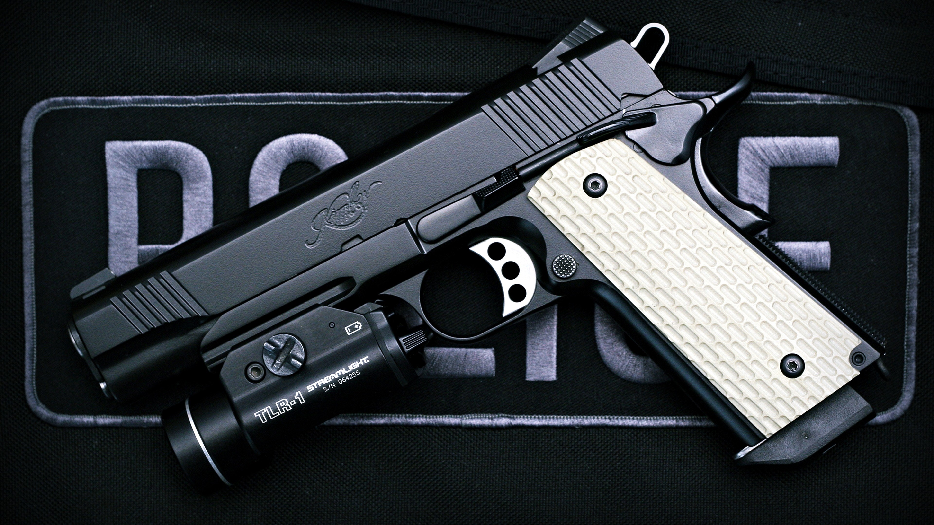 Kimber 1911 pistol with Streamlight TLR-1 HD Wallpaper