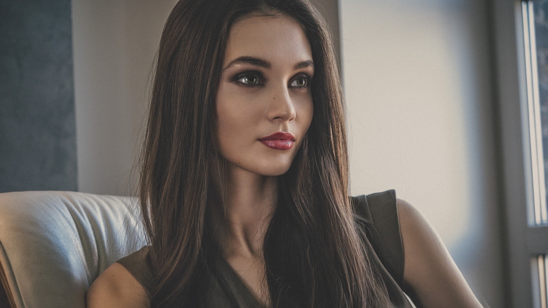 Portrait of Thoughtful Young Woman Indoors HD Wallpaper