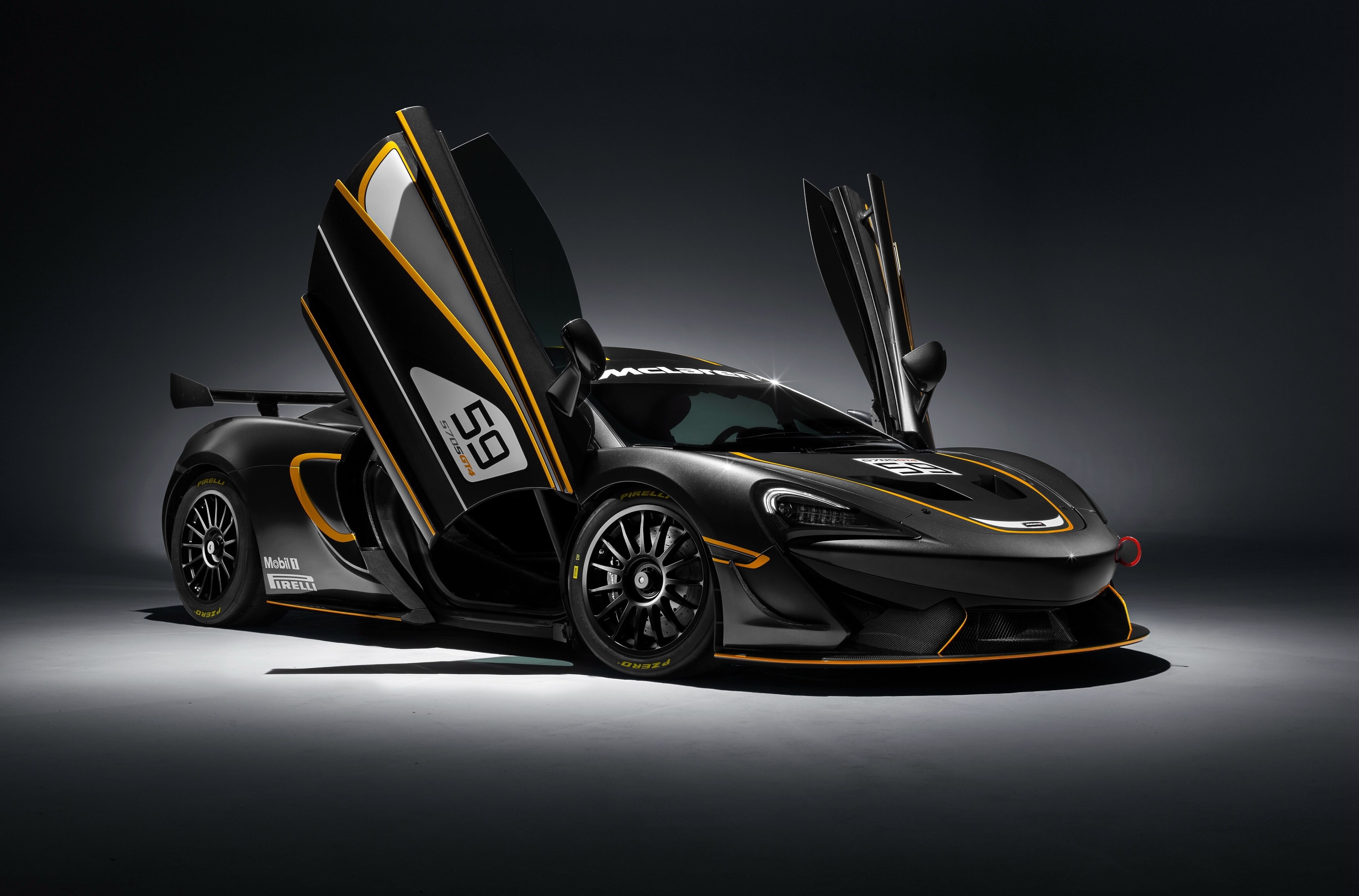 McLaren 570S GT4 race car with doors open HD Wallpaper
