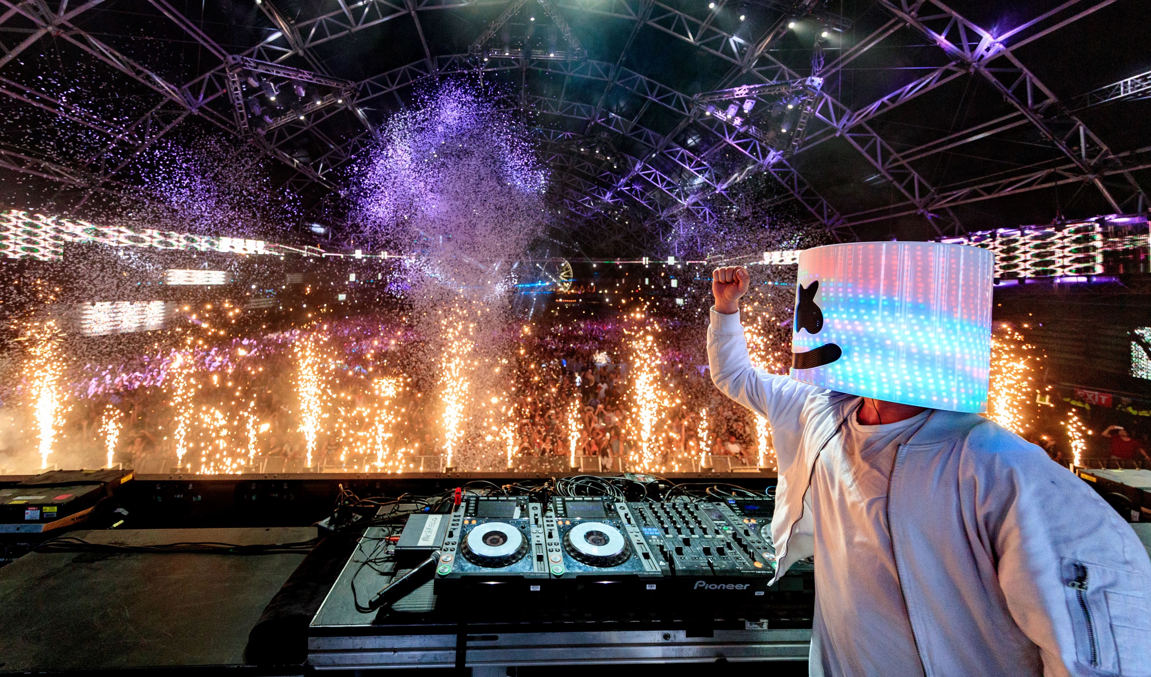 Marshmello performing live with fireworks HD Wallpaper
