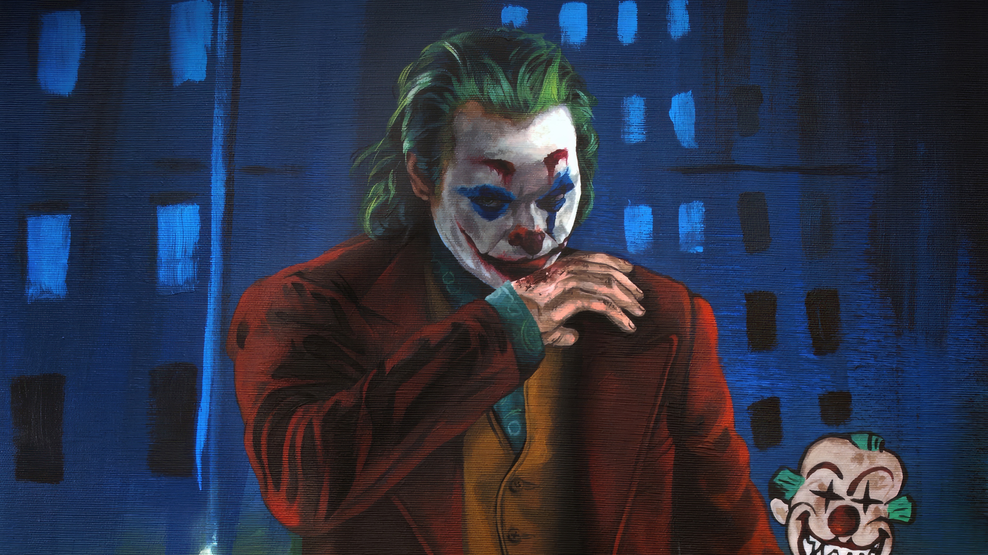Joker with a clown mask in front of a blue building HD Wallpaper