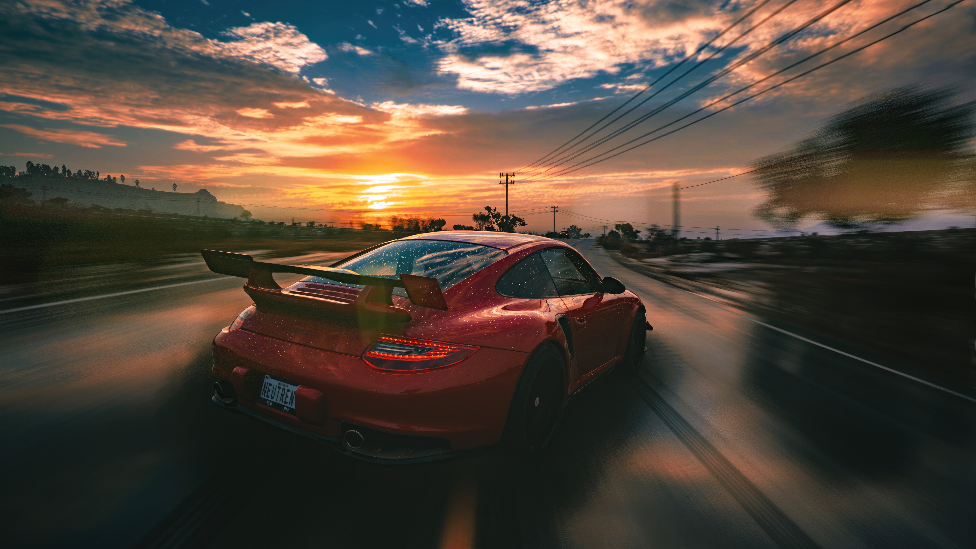 Red Porsche 911 GT2 RS driving at sunset HD Wallpaper