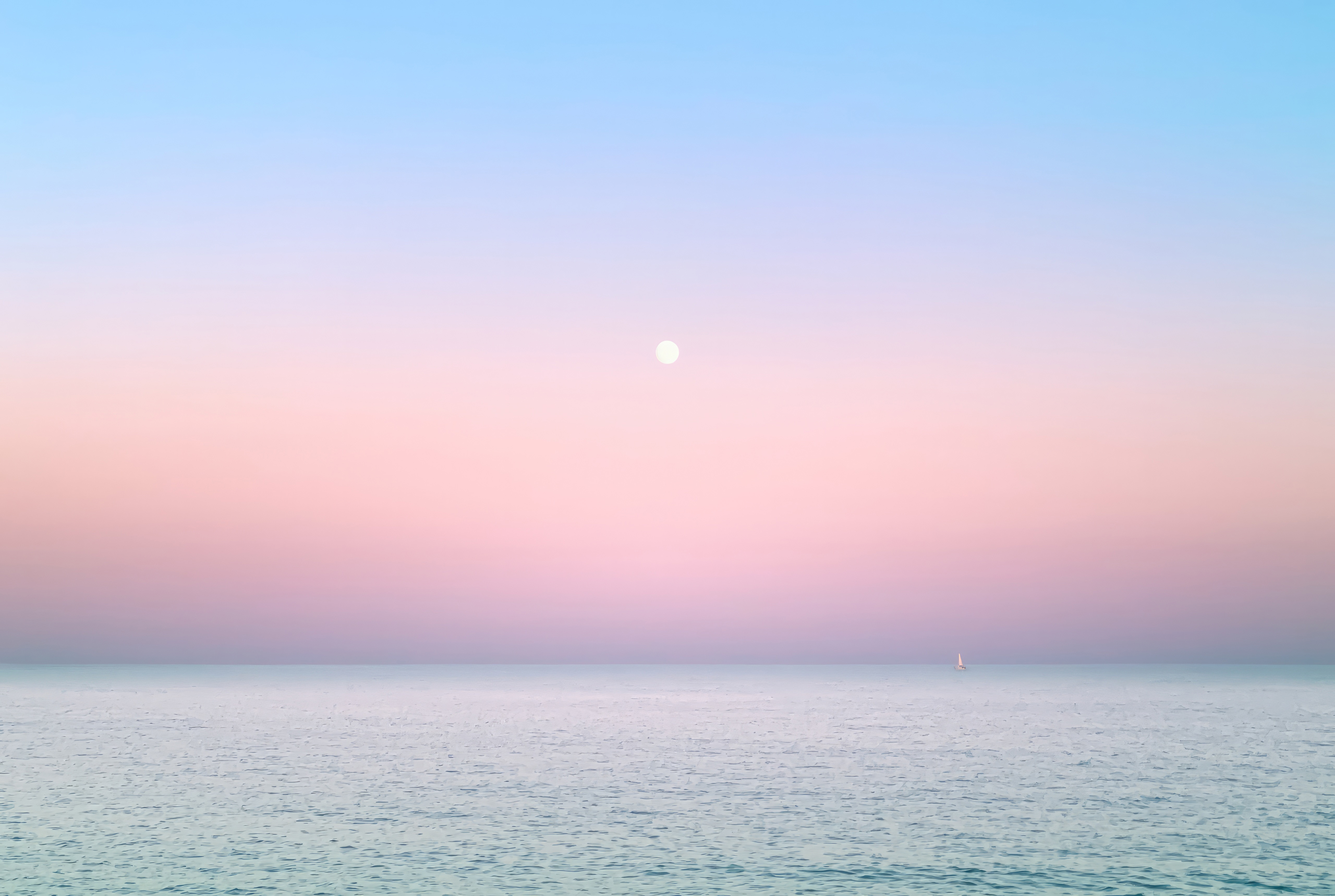 Moonlit Ocean at Dawn with a Distant Sailboat HD Wallpaper