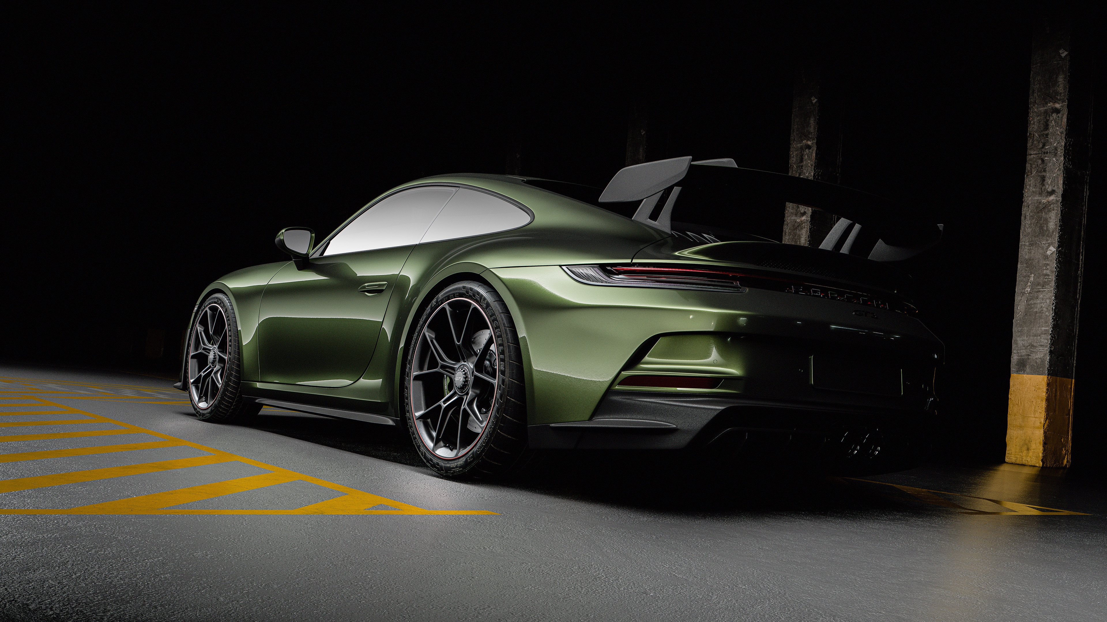 Green Porsche 911 GT3 RS parked in a garage HD Wallpaper