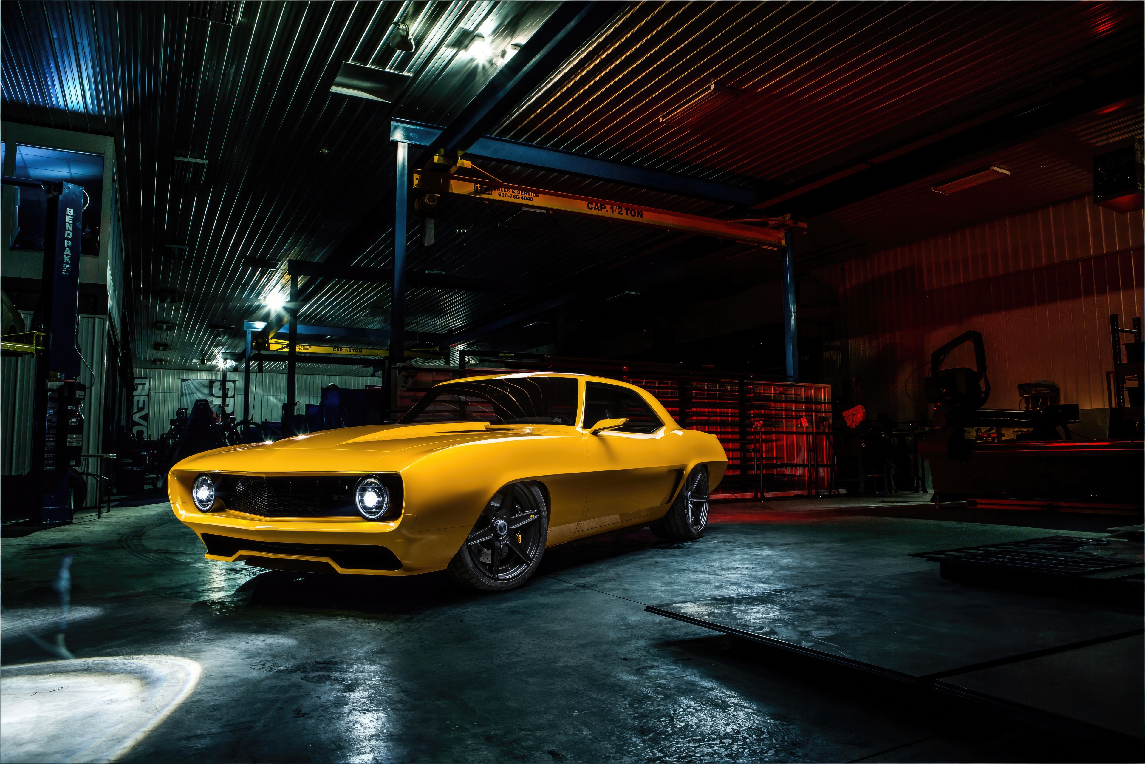 Yellow Chevrolet Camaro Inferno in a garage HD Wallpaper