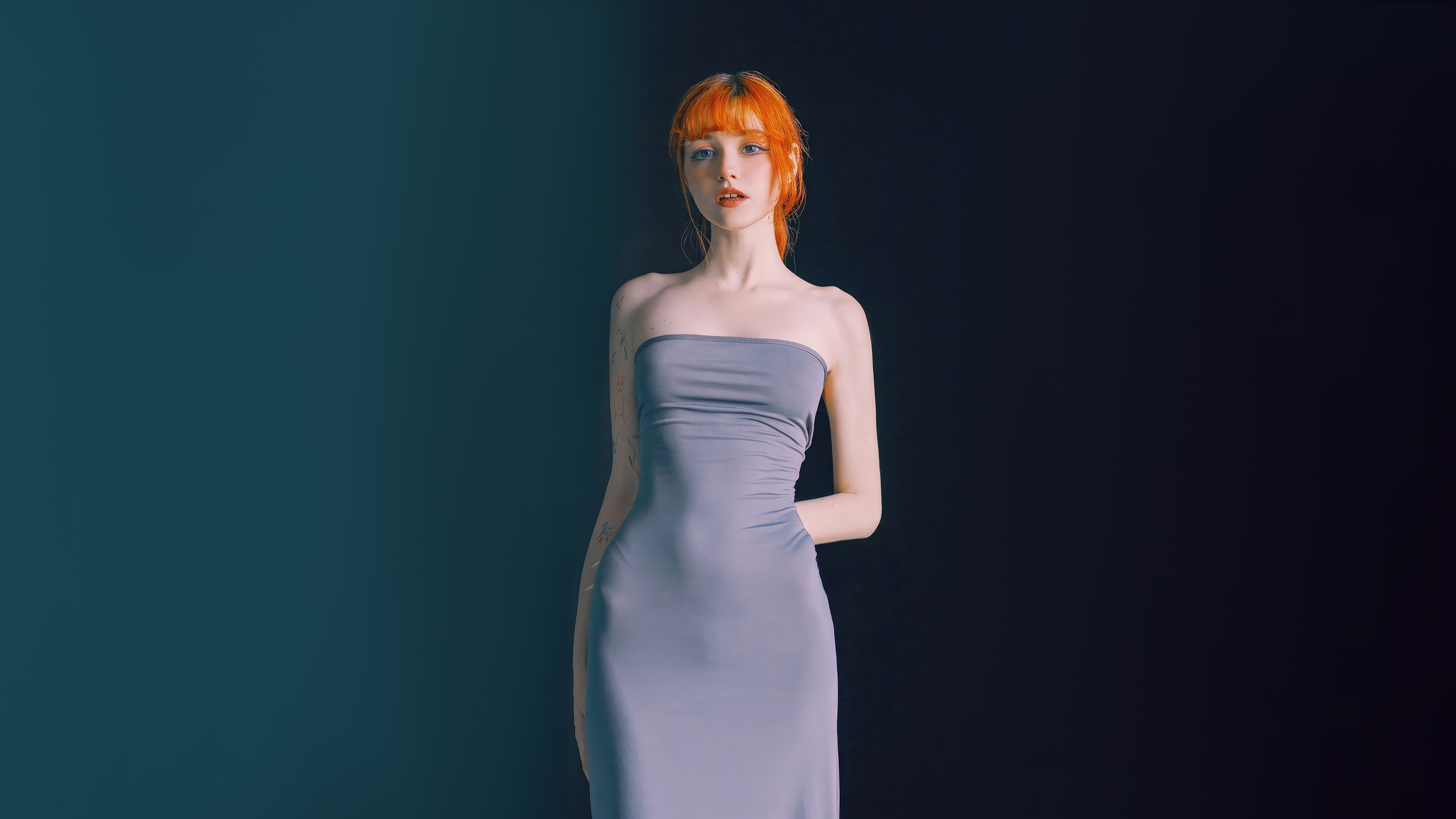 Girl with orange hair in a grey dress HD Wallpaper