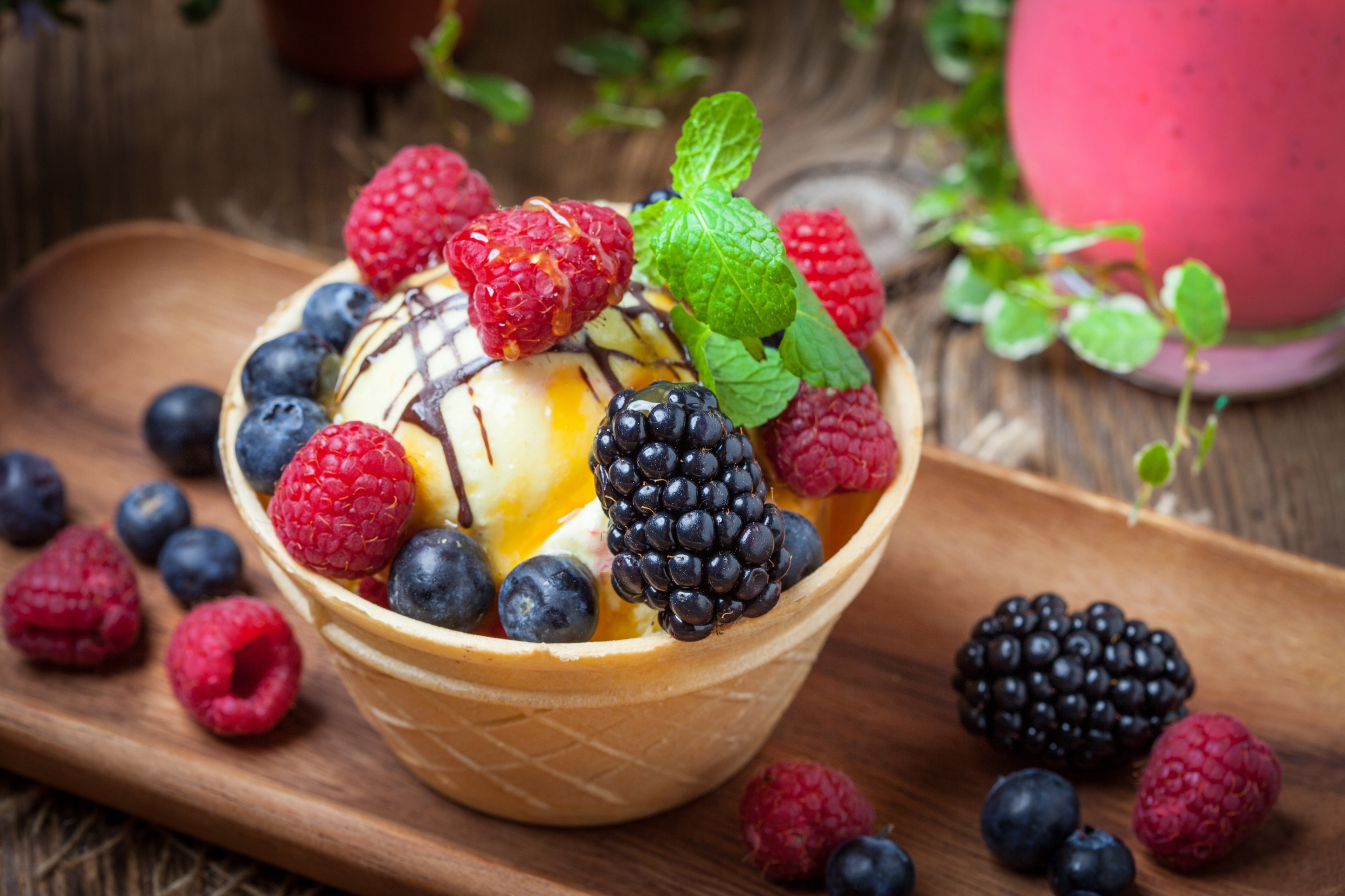 Ice cream with berries and chocolate drizzle HD Wallpaper