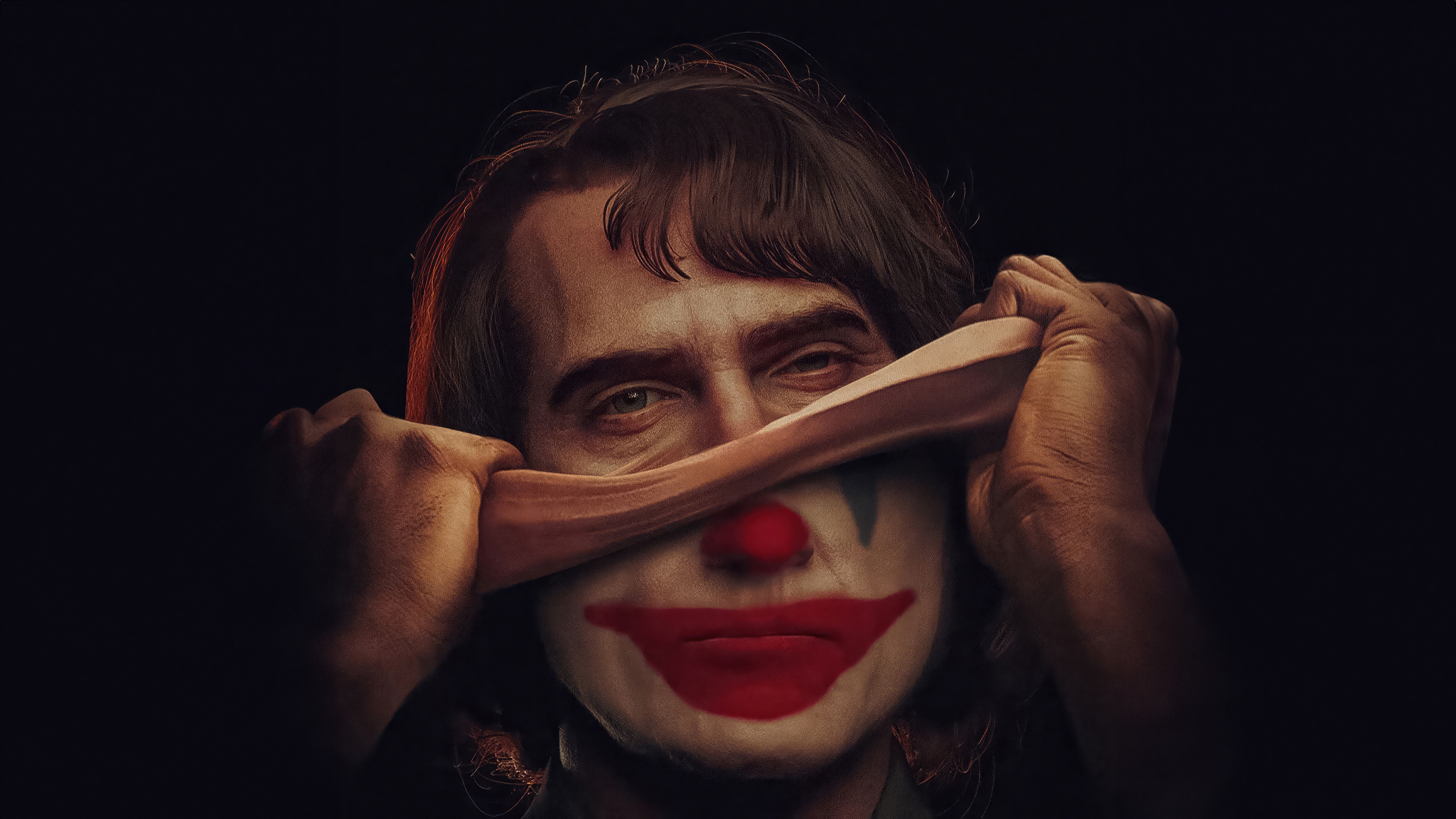 Joker's Face Being Pulled Off HD Wallpaper