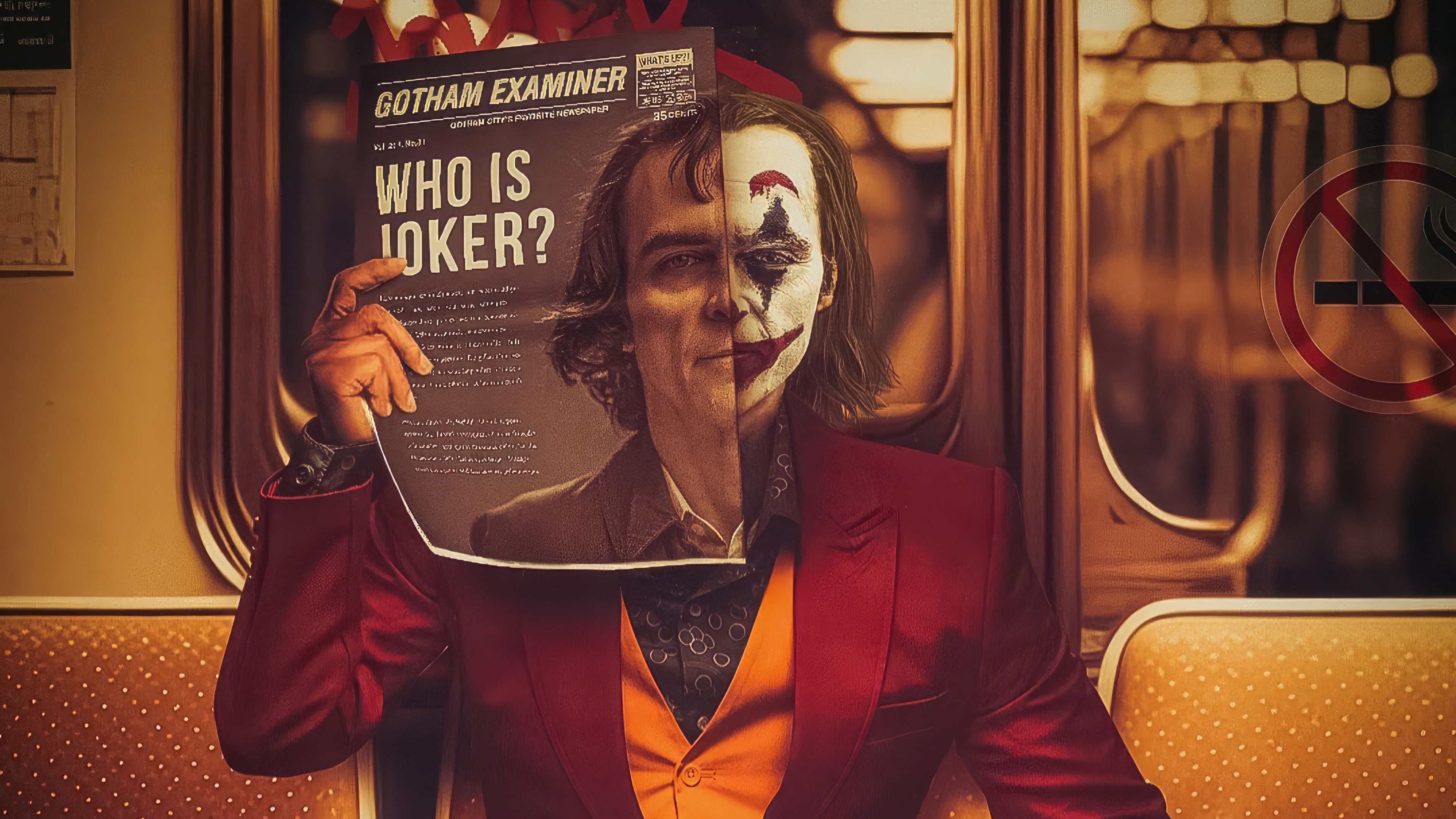 Joker holding a newspaper in a train HD Wallpaper