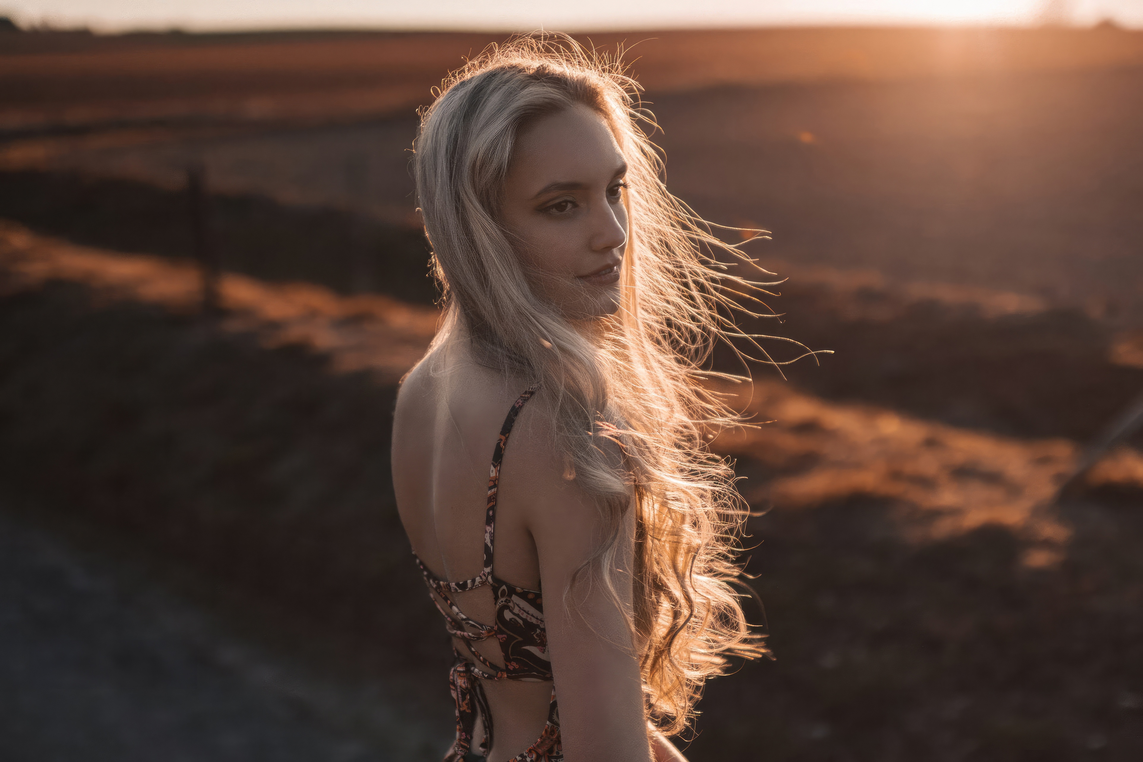 Girl with blonde hair in sunlight HD Wallpaper