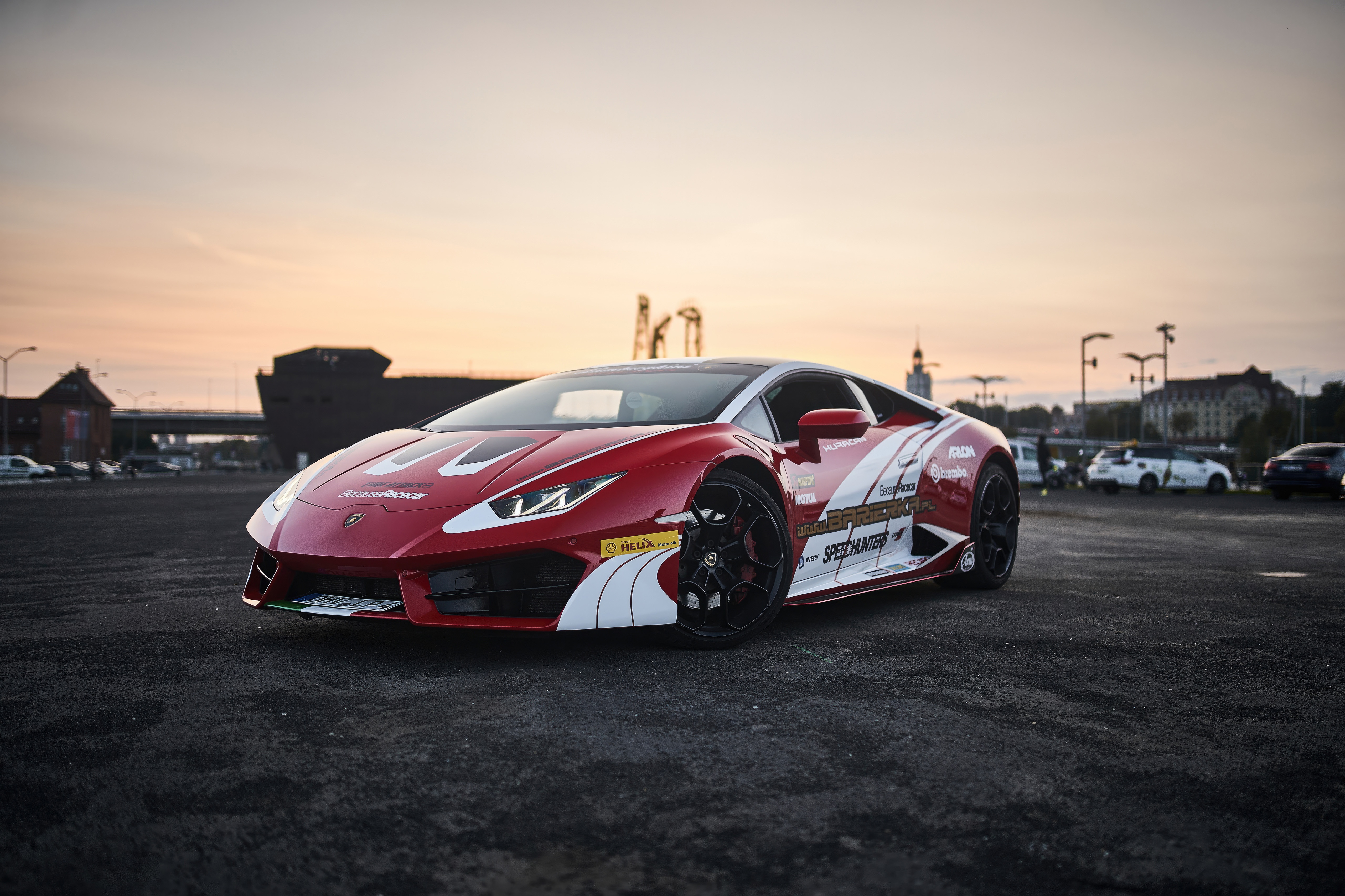 Red Lamborghini Huracan with white racing stripes HD Wallpaper
