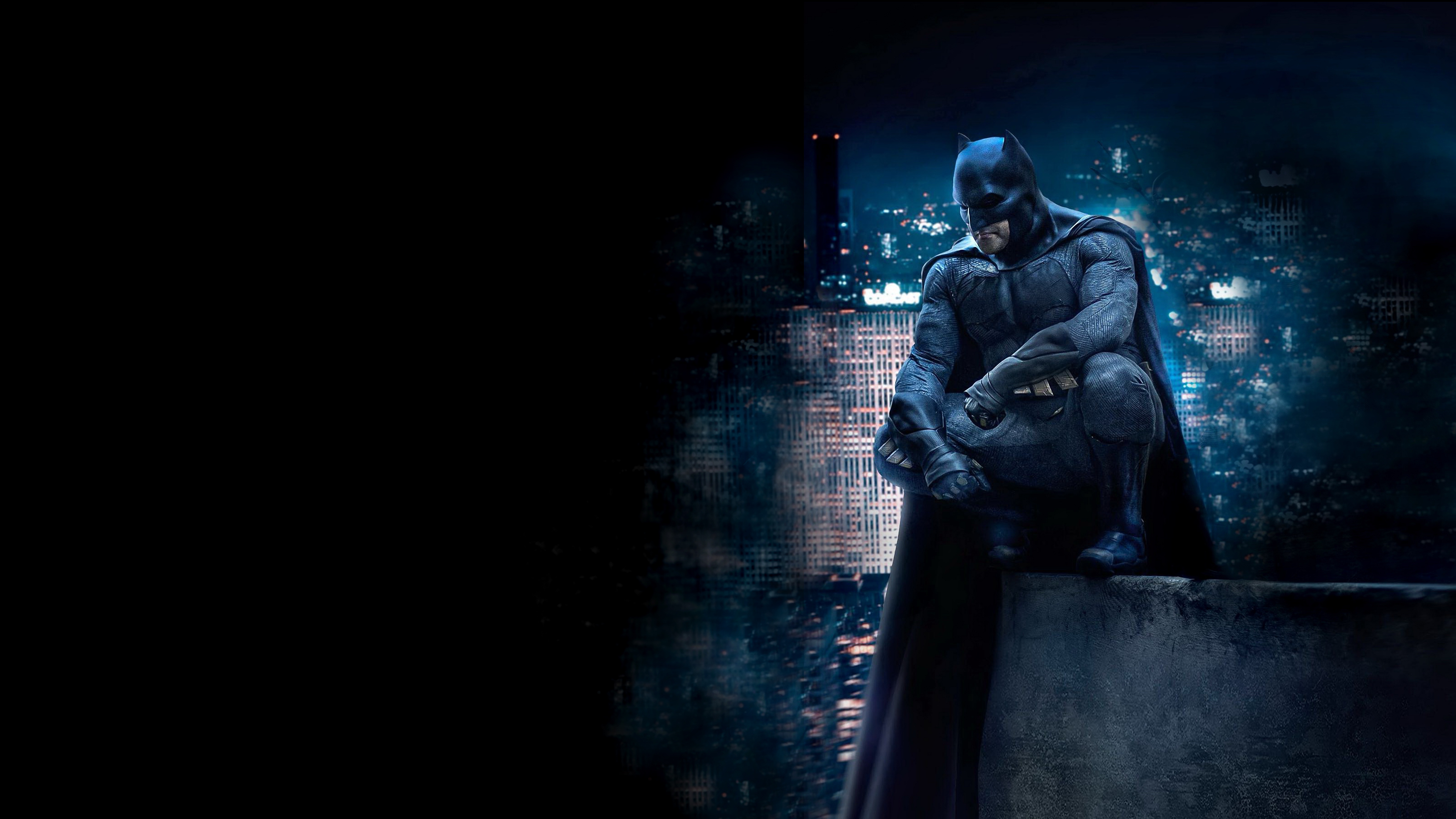 Batman Crouching on a Ledge Overlooking City HD Wallpaper