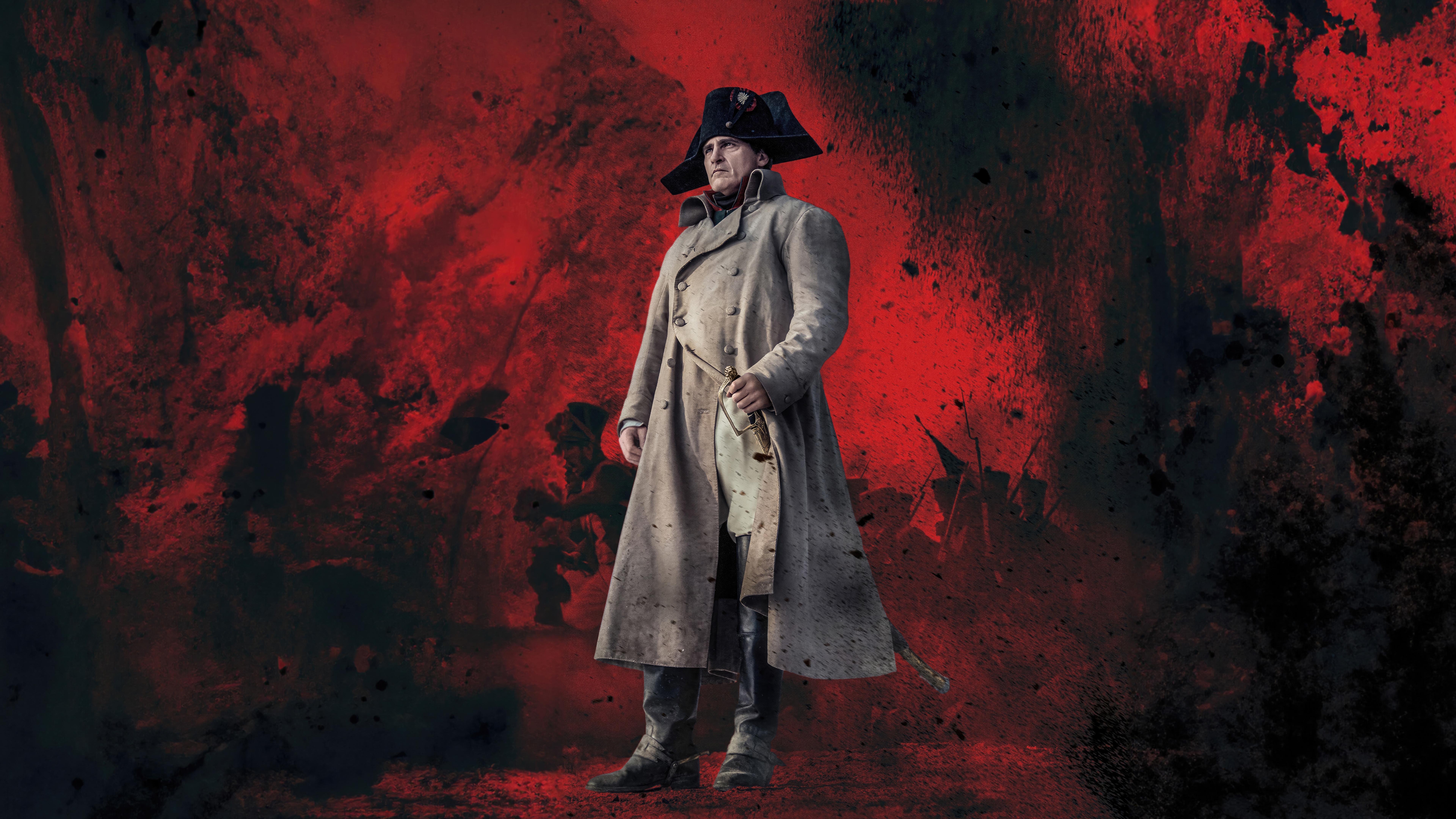 Joaquin Phoenix as Napoleon in a dramatic scene HD Wallpaper