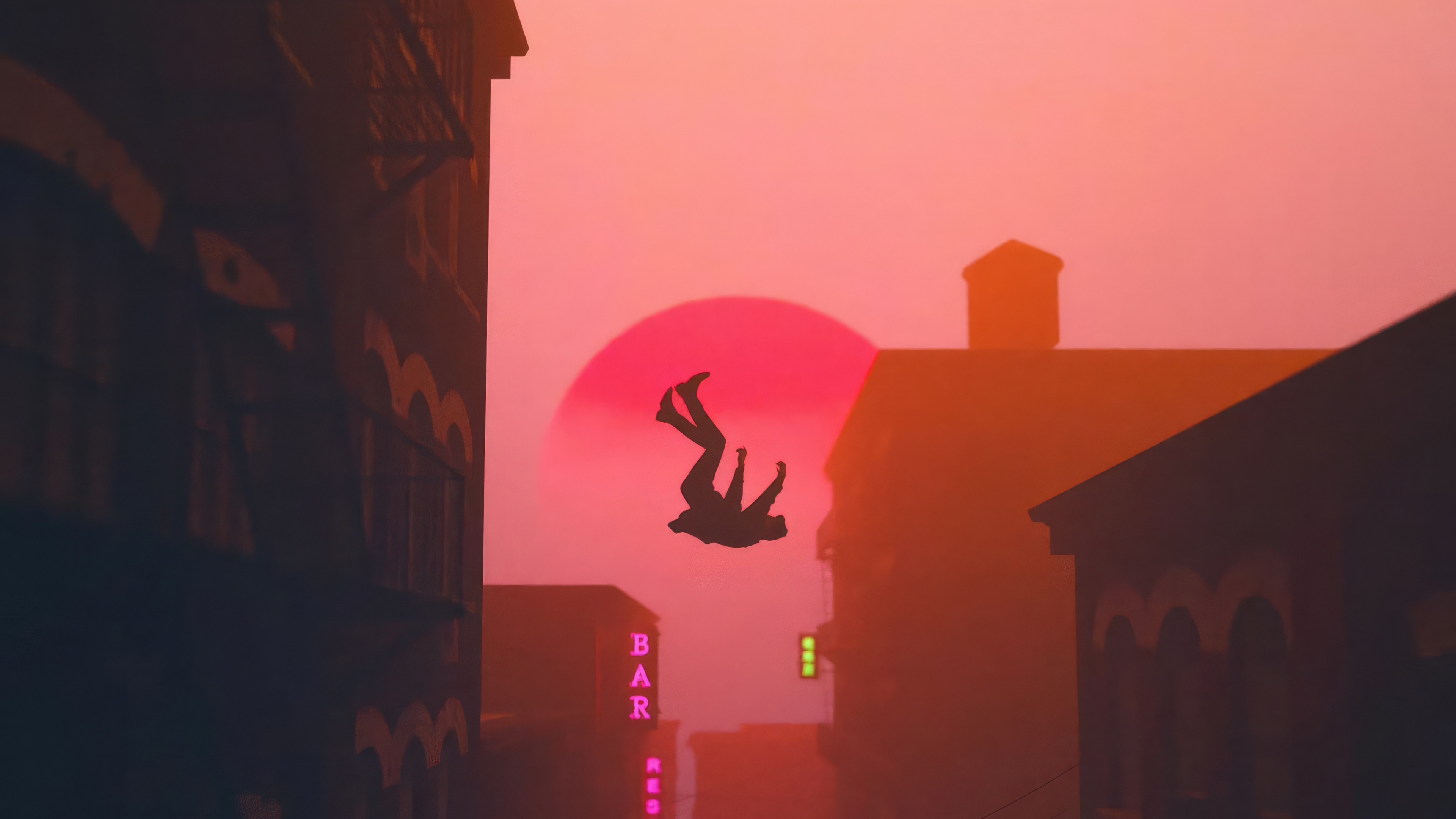 Silhouette of a person in freefall over a city at sunset HD Wallpaper