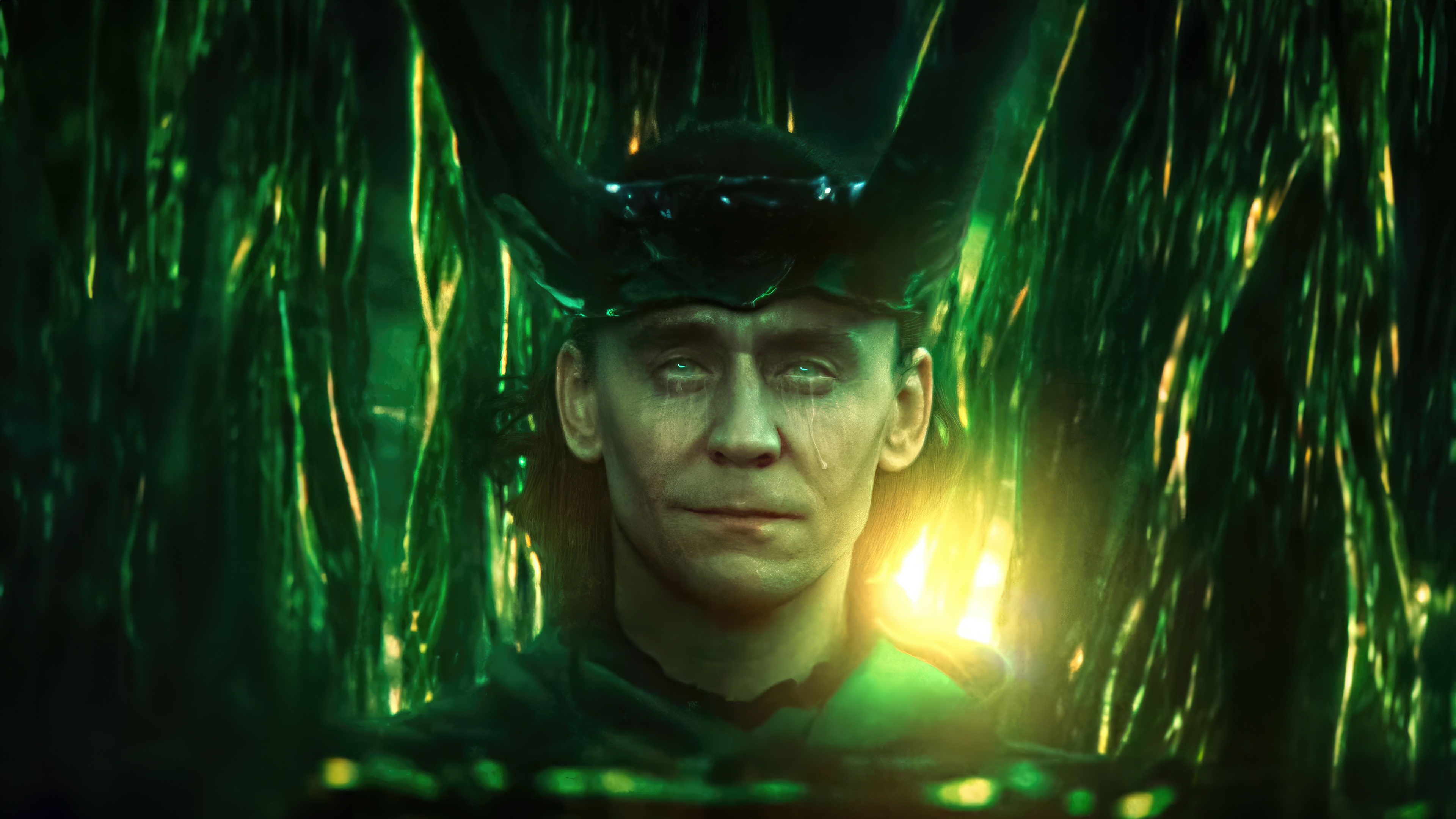 Loki in a green, glowing environment HD Wallpaper