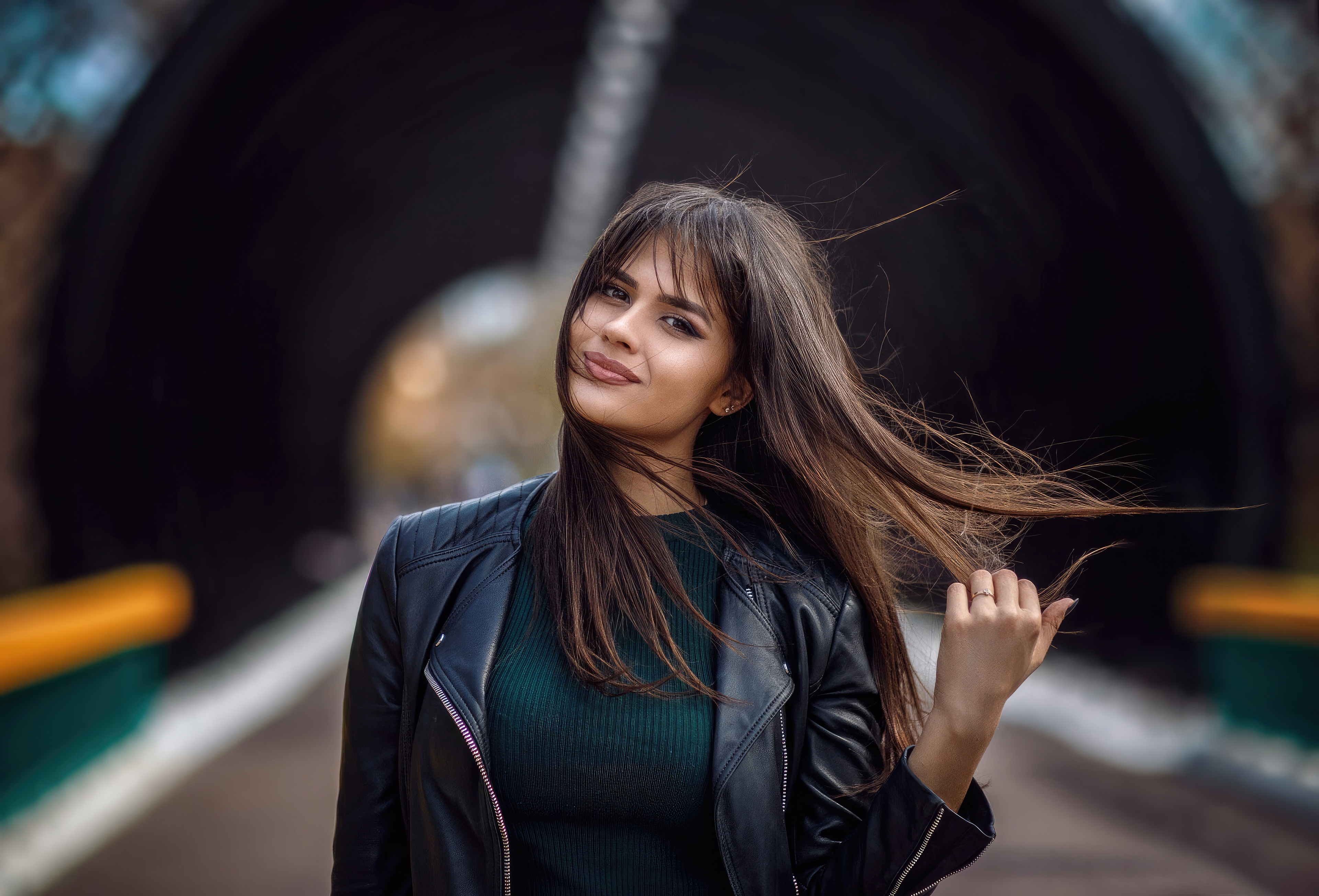 Girl in a leather jacket smiling HD Wallpaper