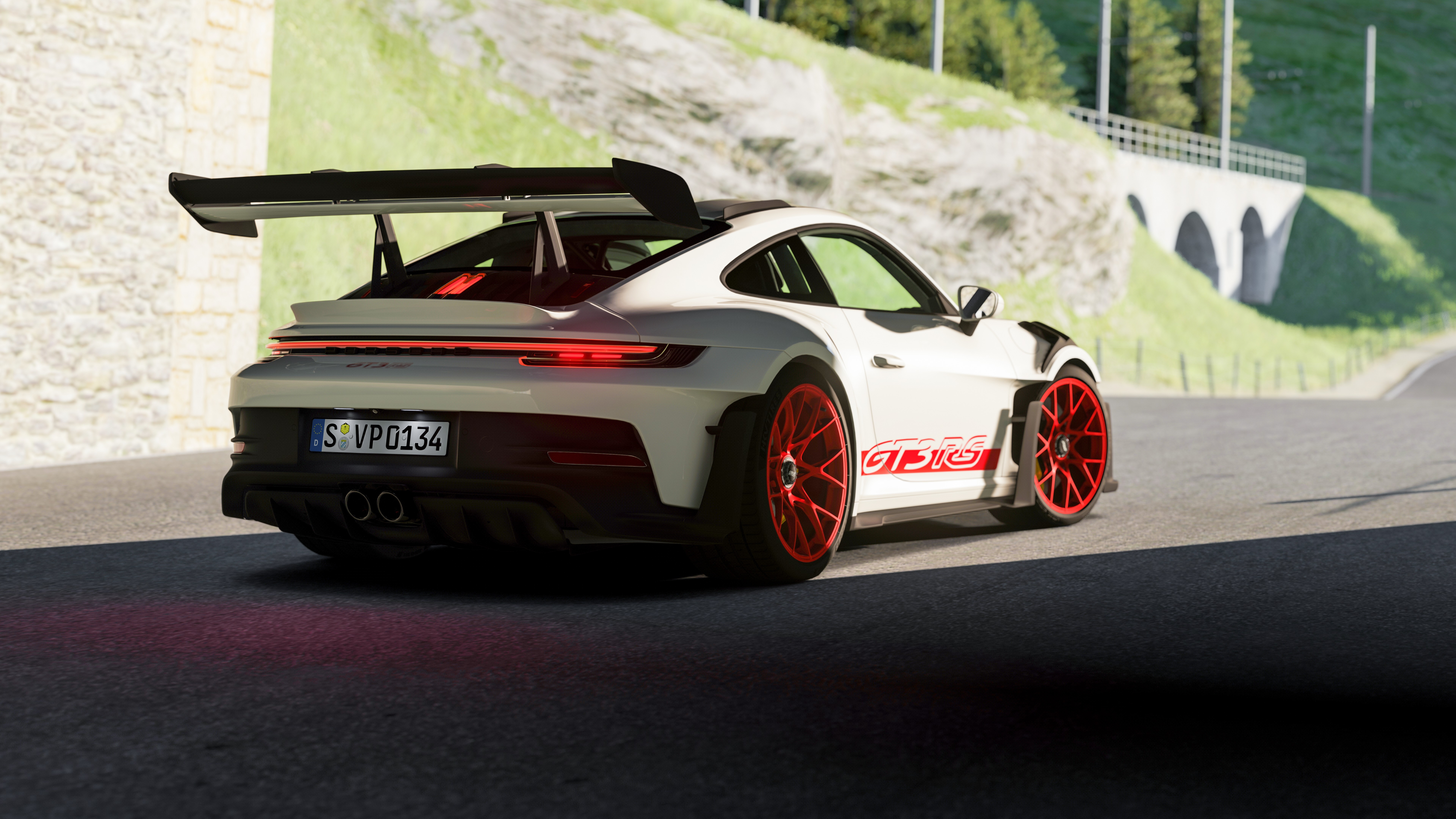 White Porsche 992 GT3 RS with red wheels HD Wallpaper