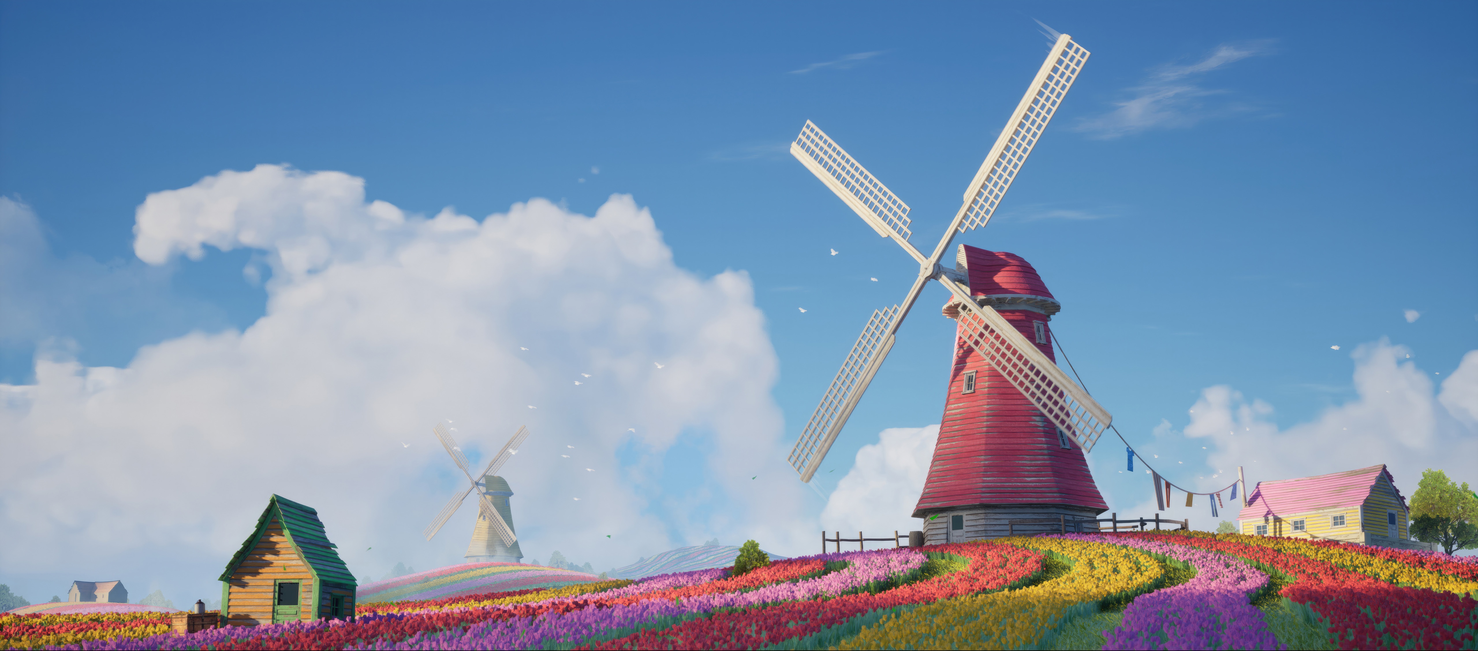 Windmills in a colorful tulip field under a blue sky HD Wallpaper