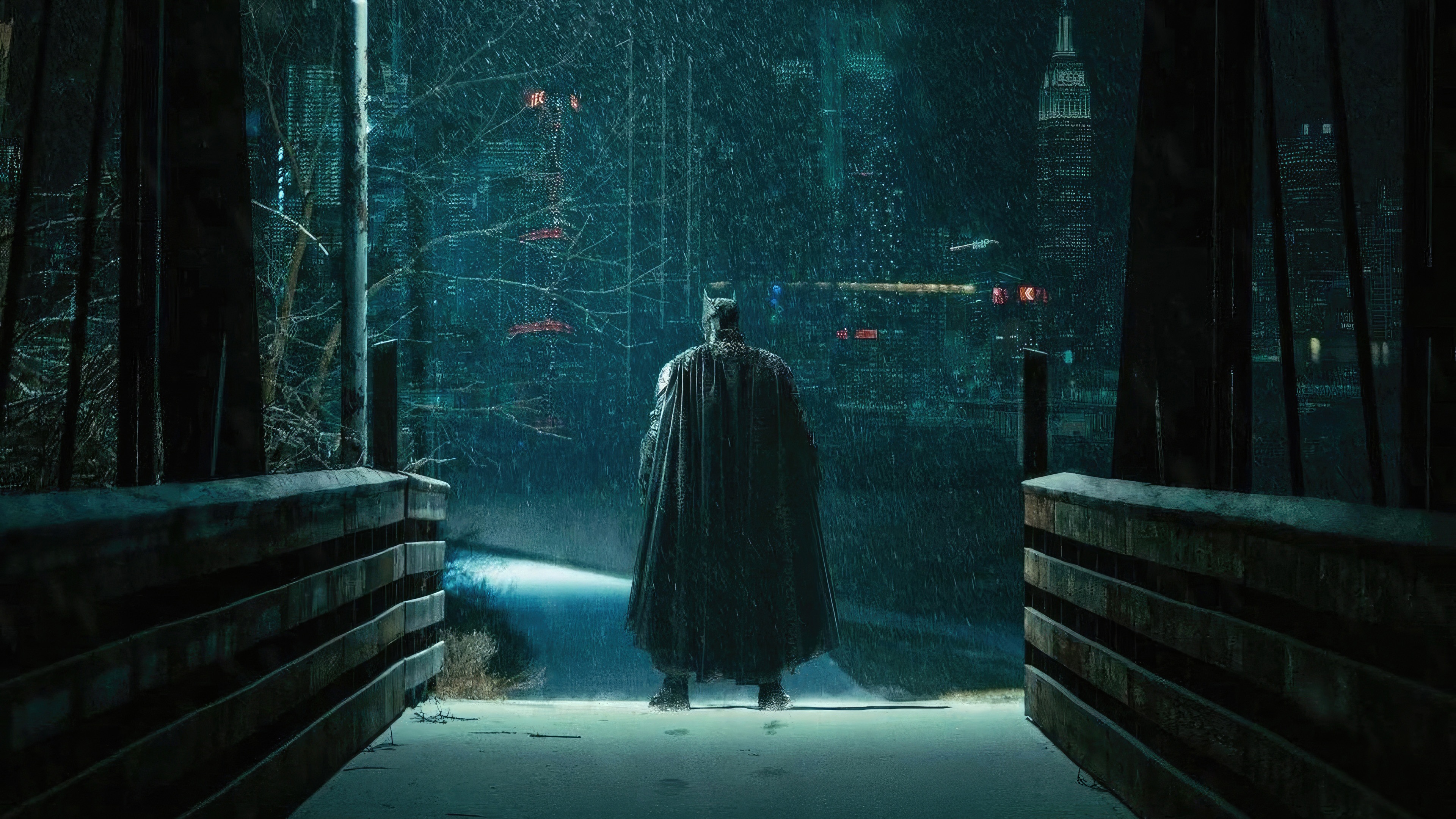 Batman Standing in Snow Overlooking City HD Wallpaper